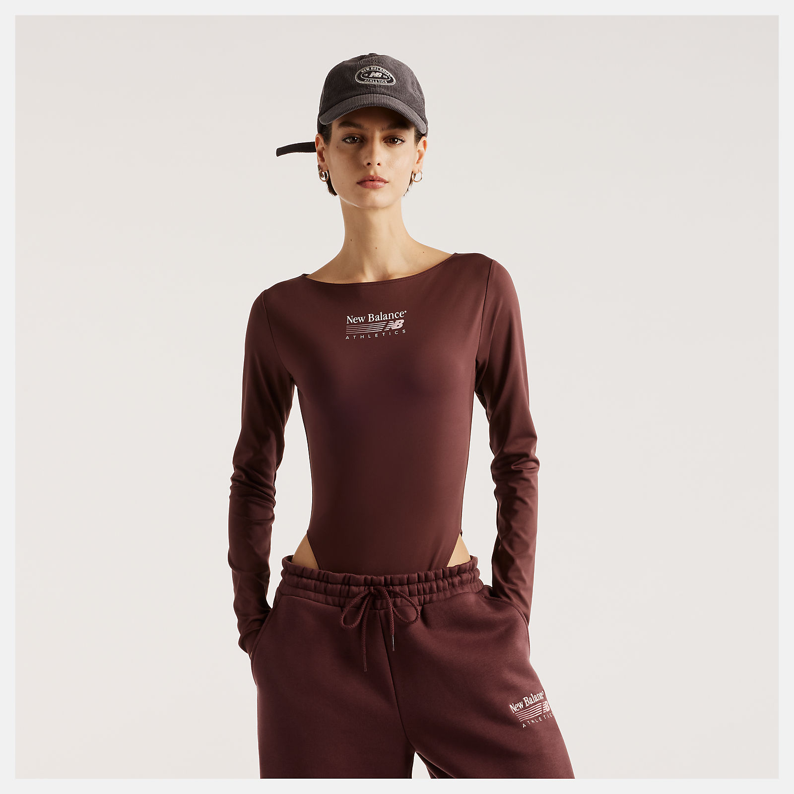 New Balance Trackside Long Sleeve Bodysuit, WS62Y3THYLR