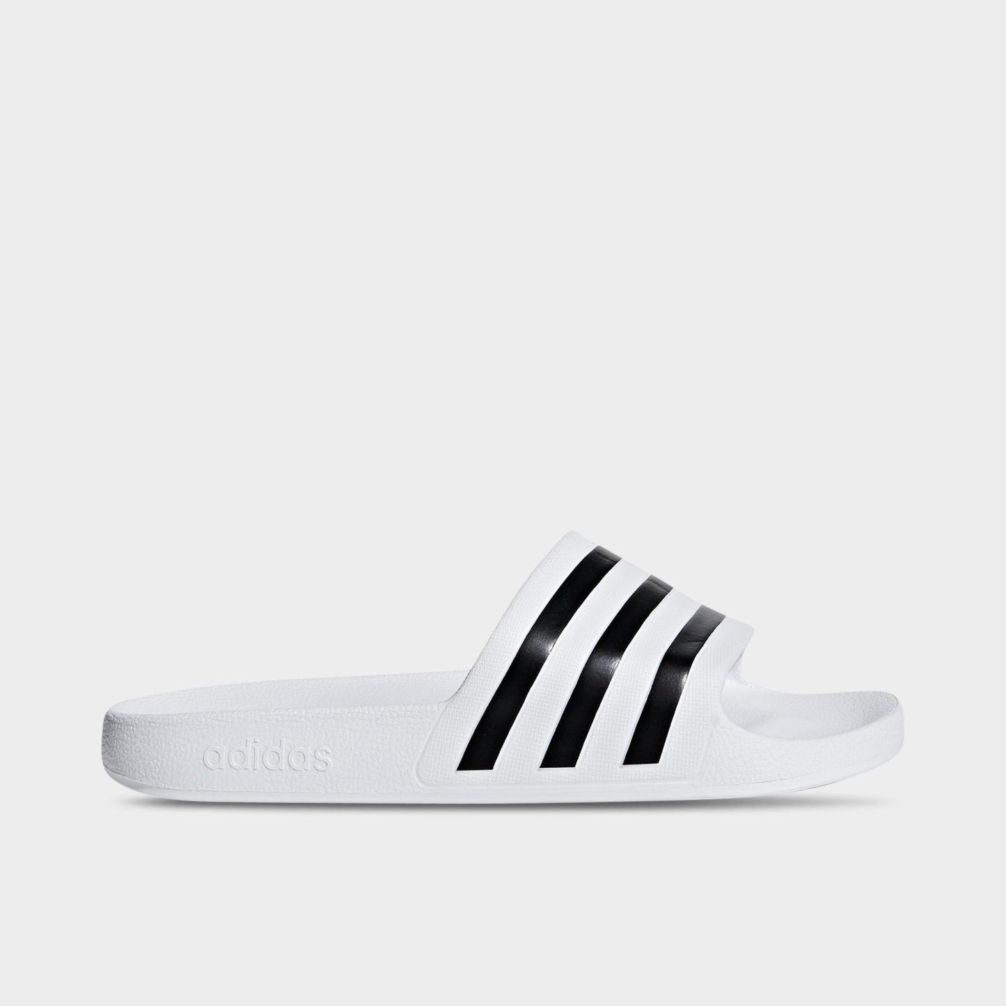 adidas adilette Aqua Slide Sandals - White/Black/White - Left shoe facing left. Outside of the shoe.