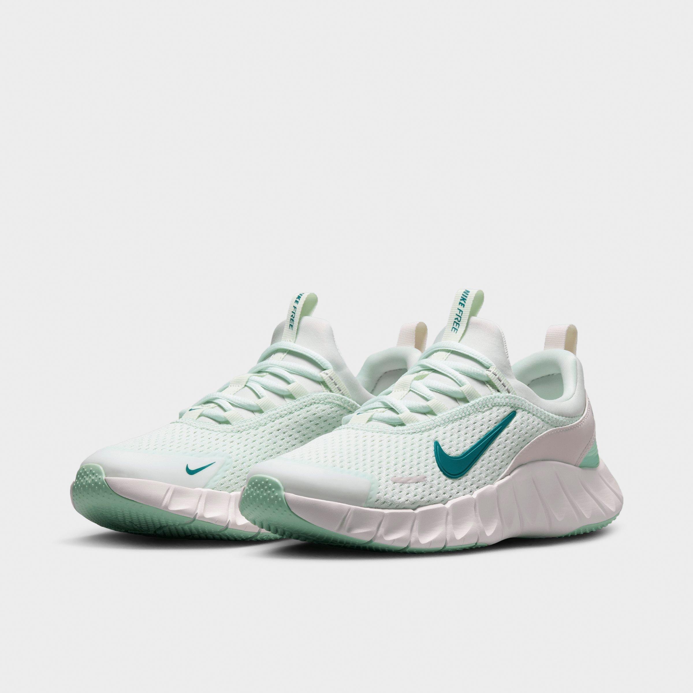 Big Kids' Nithtke Free Ride Running Shoes - Barely Green/Arctic Green/Phantom/Bright Spruce - Both shoes facing left
