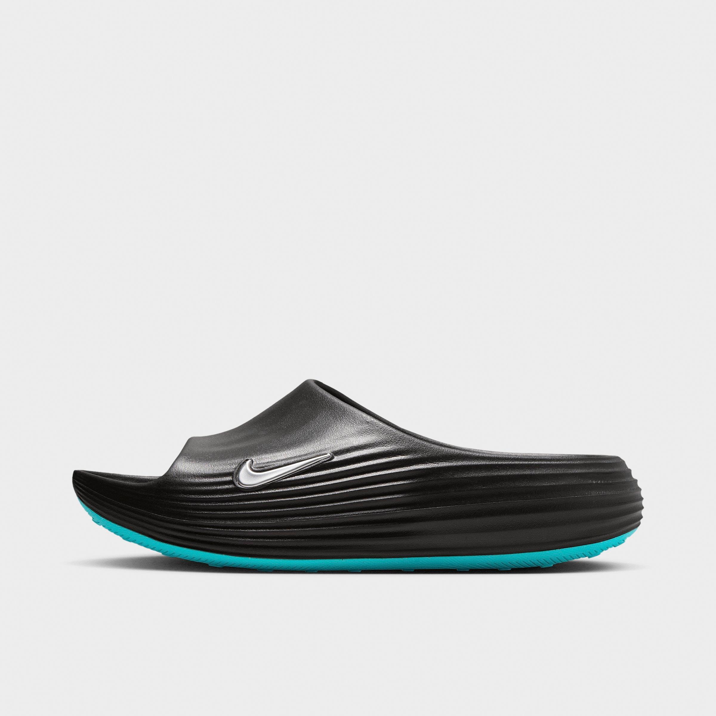 Men's Nithtke ReactX Rejuven8 Slide Sandals - Black/Gamma Blue/Metallic Silver - Left shoe facing left. Outside of the shoe.