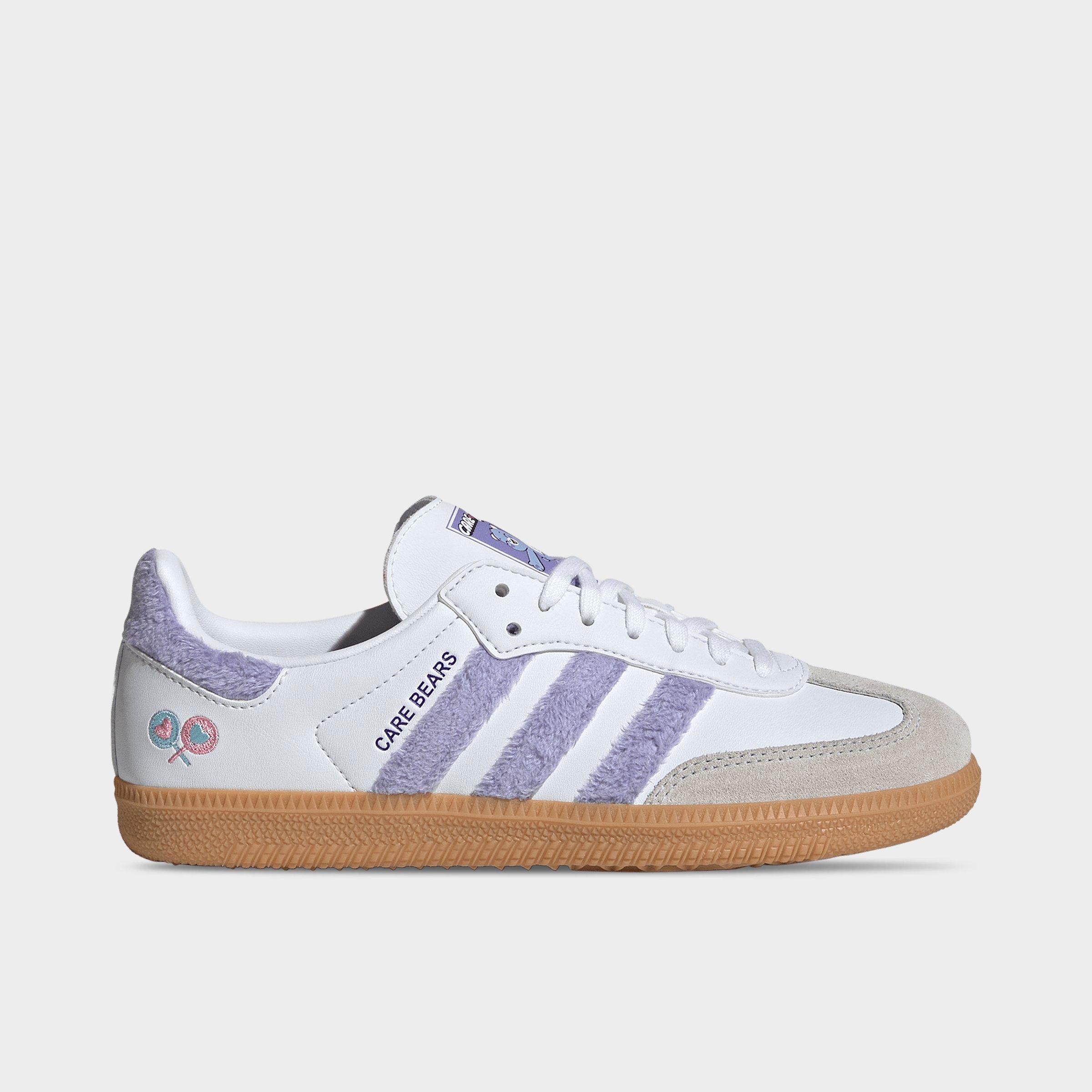 Big Kids' adidas Originals Samba OG Casual Shoes - Part 1 - Light Purple/Cloud White/Blue Dawn - Left shoe facing left. Outside of the shoe.