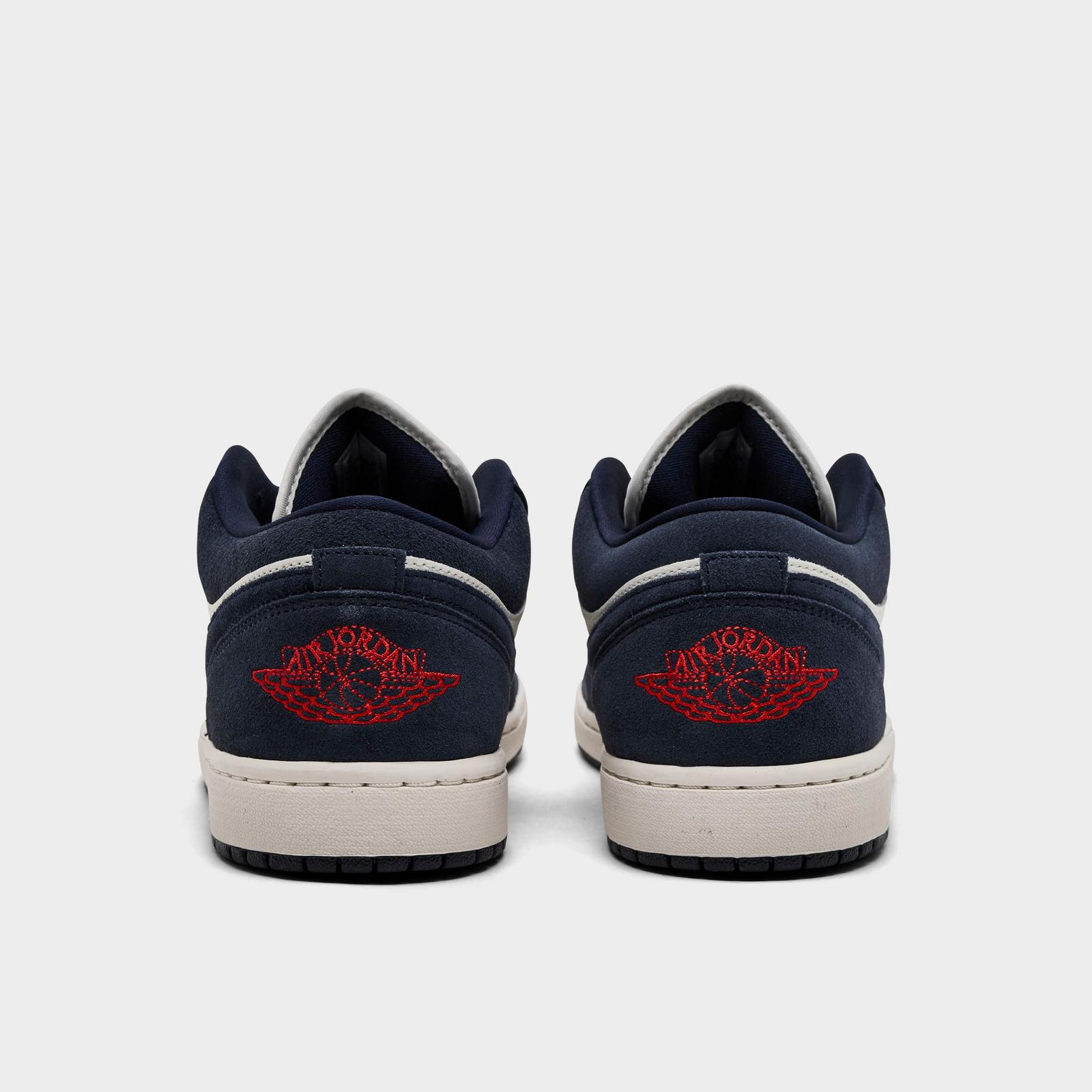 Men's Air Jordan Retro 1 Low SE Casual Shoes - Obsidian/University Gold/Chile Red/Obsidian - Left shoe facing left. Outside of the shoe. - view 4