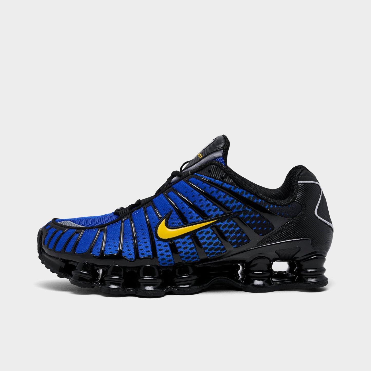 Men's Nithtke Shox TL Casual Shoes - Part 2 - Black/Metallic Silver/Lyon Blue/Varsity Maize - Left shoe facing left. Outside of the shoe.