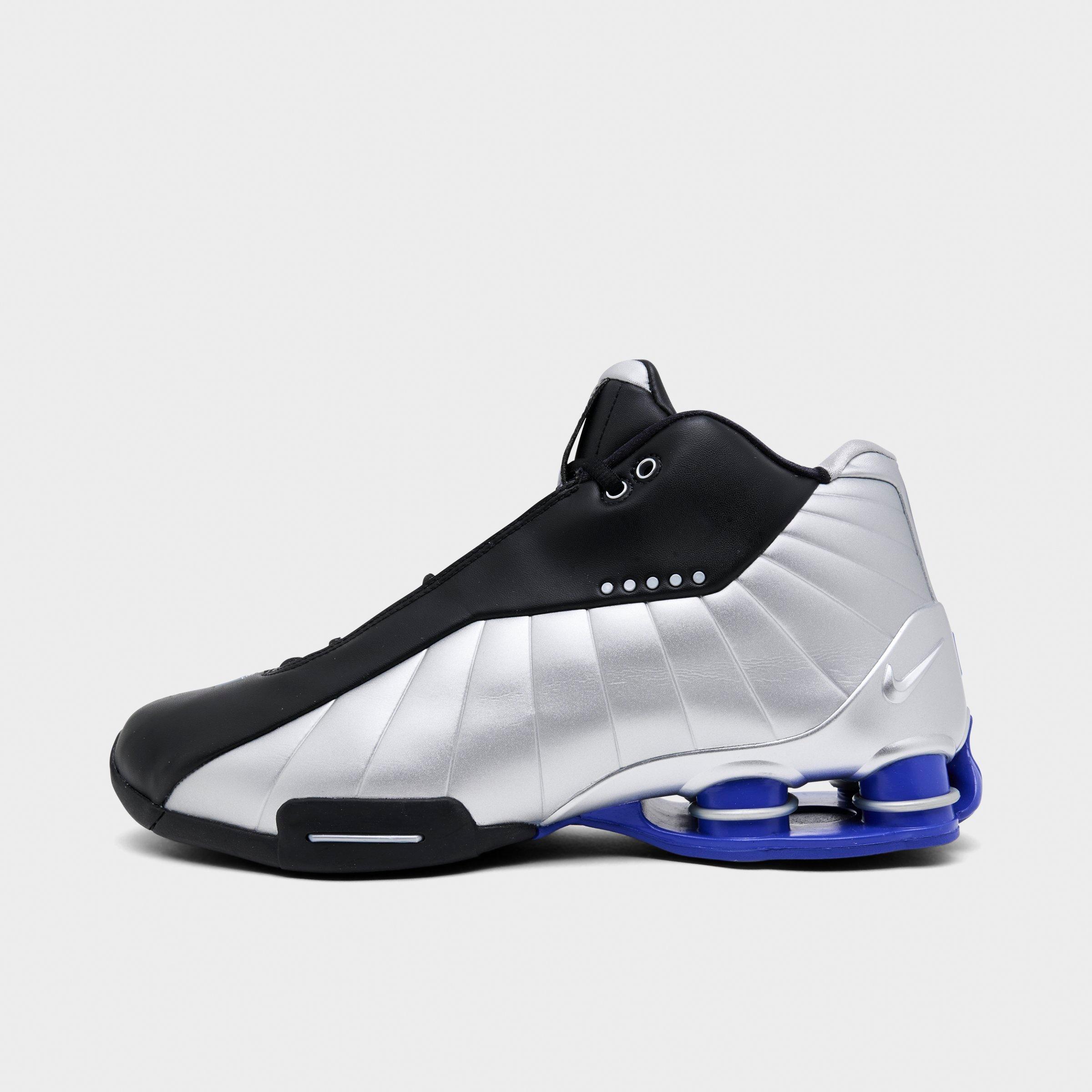Men's Nithtke Shox BB4 Basketball Shoes - Black/Lapis/Metallic Silver - Left shoe facing left. Outside of the shoe.