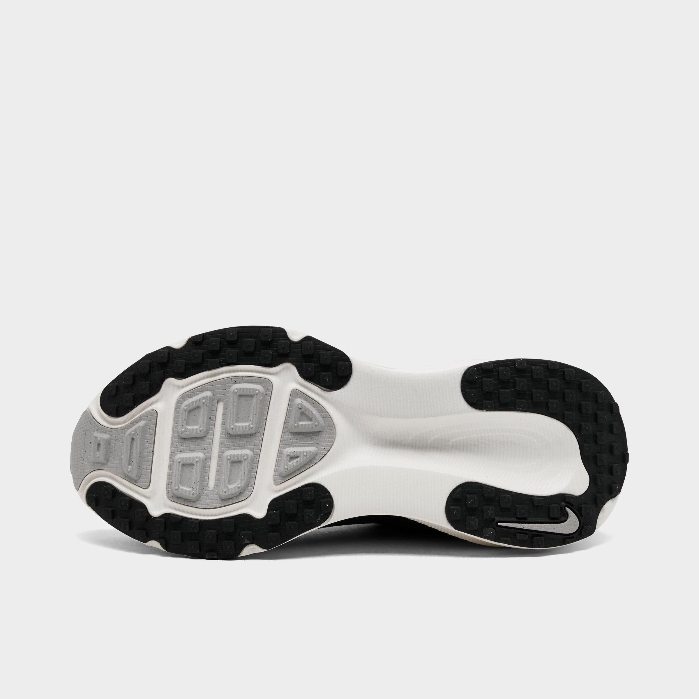 Women's Nithtke Vomero 18 Running Shoes - Part 1 - Black/Coconut Milk/Light Iron Ore/Summit White - Bottom view
