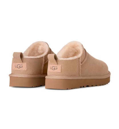 UGG® Kids' Classic Micro Slip-On Booties - Sand