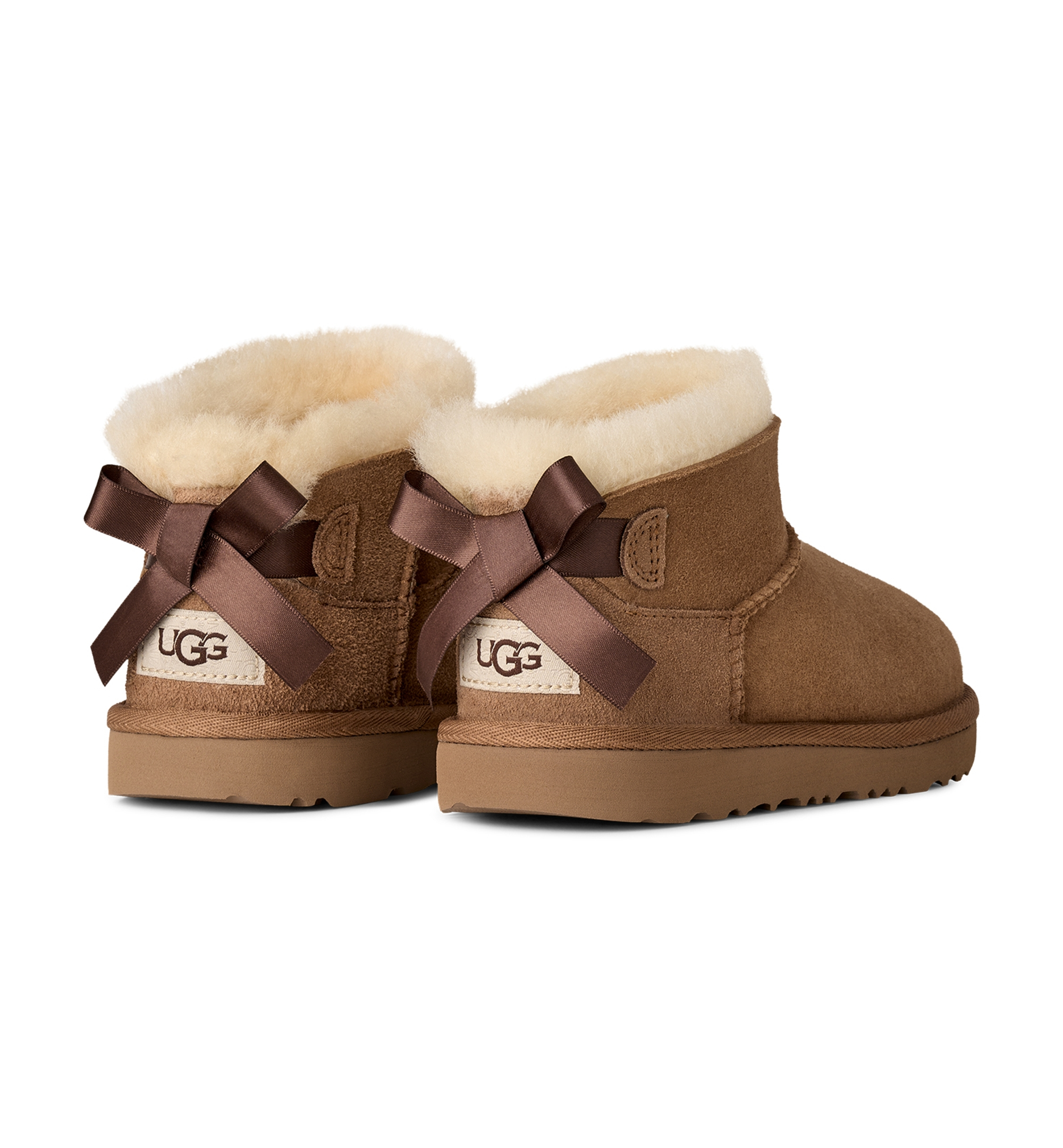 UGG® Kids Ultra Mini Bailey Bow Round Toe Booties - Chestnut