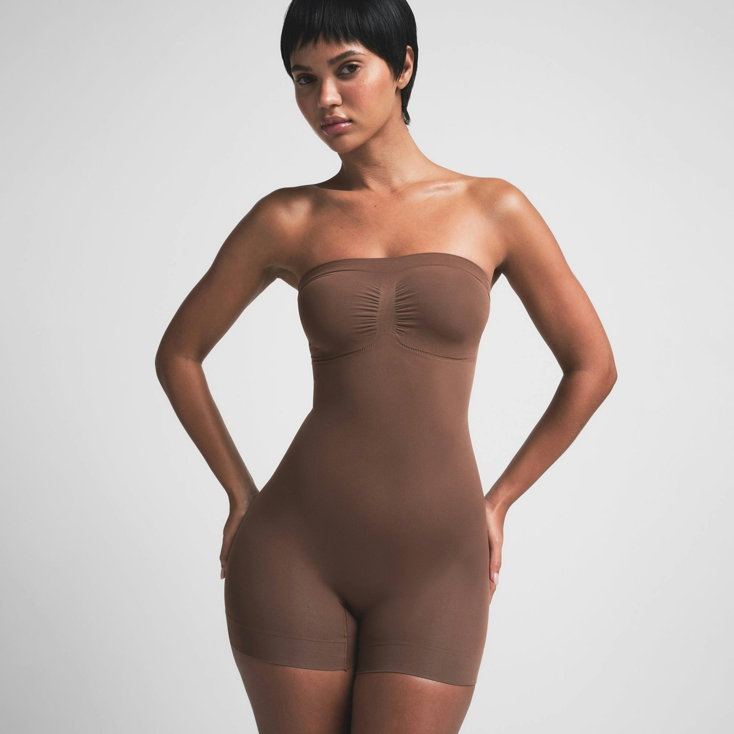 SEAMLESS SCULPT STRAPLESS SHORTIE BODYSUIT - JASPER