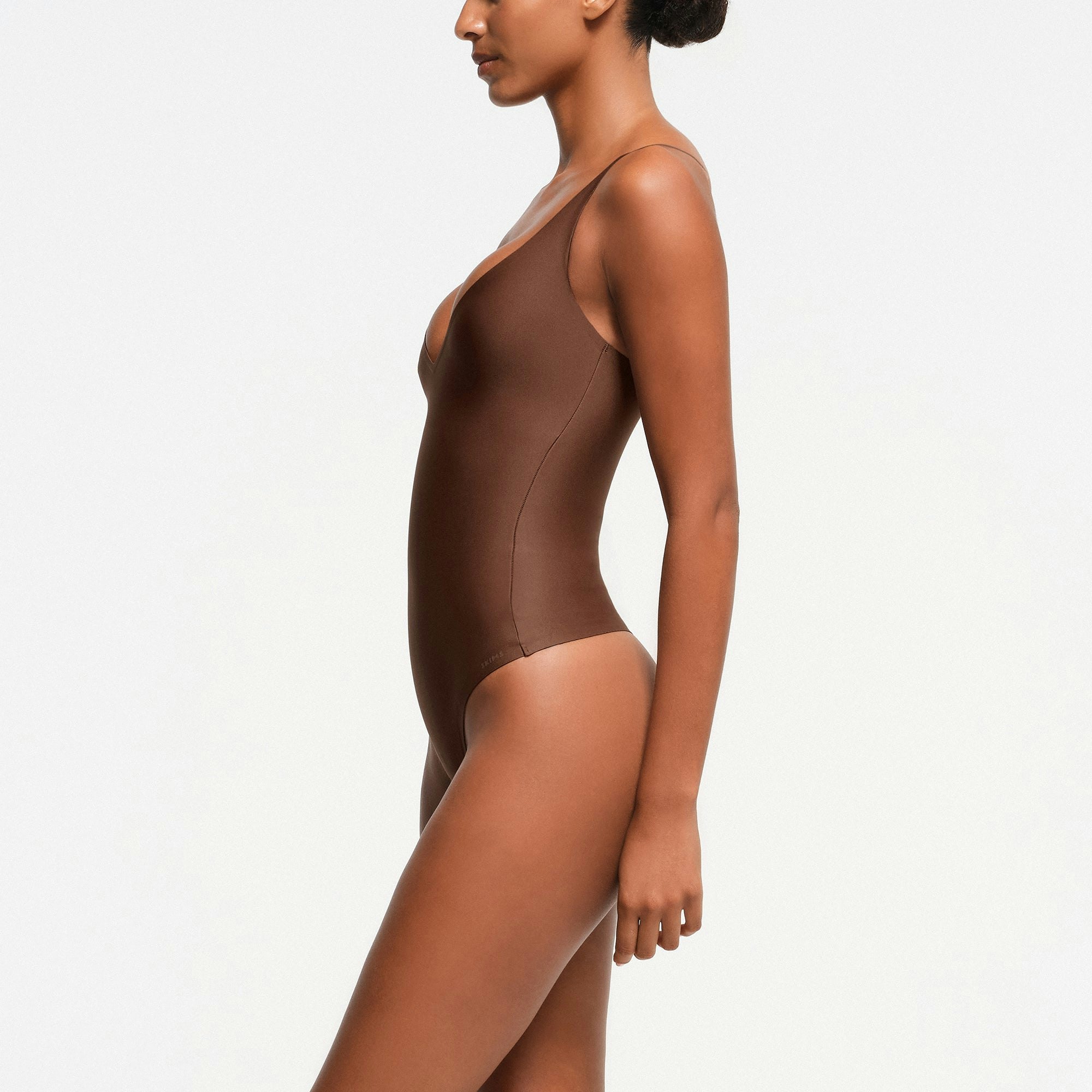 SKIMS BODY CORE SCULPT PLUNGE THONG BODYSUIT - JASPER