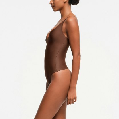 SKIMS BODY CORE SCULPT PLUNGE THONG BODYSUIT - JASPER