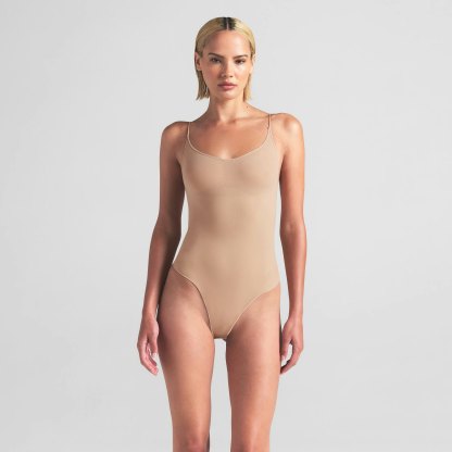 SHEER SEAMLESS THONG BODYSUIT - CLAY