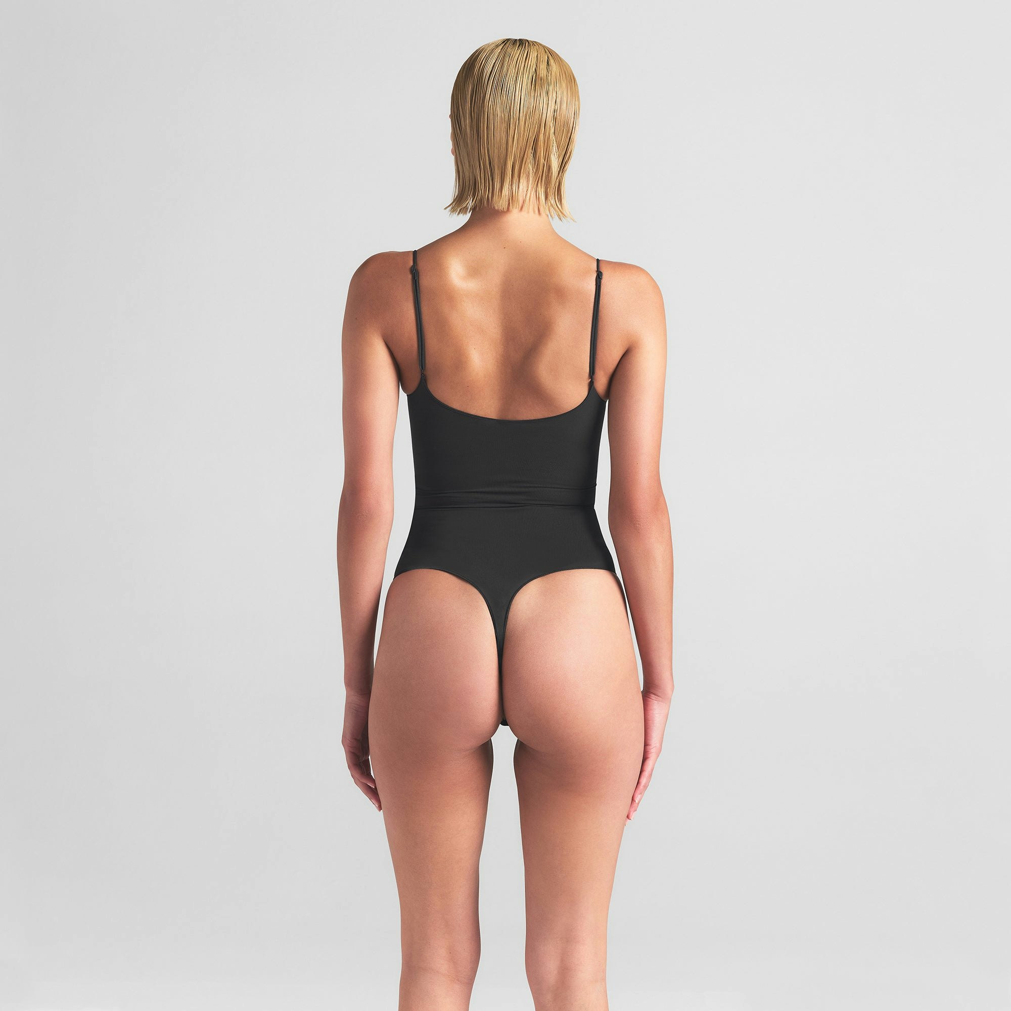 SHEER SEAMLESS THONG BODYSUIT - ONYX