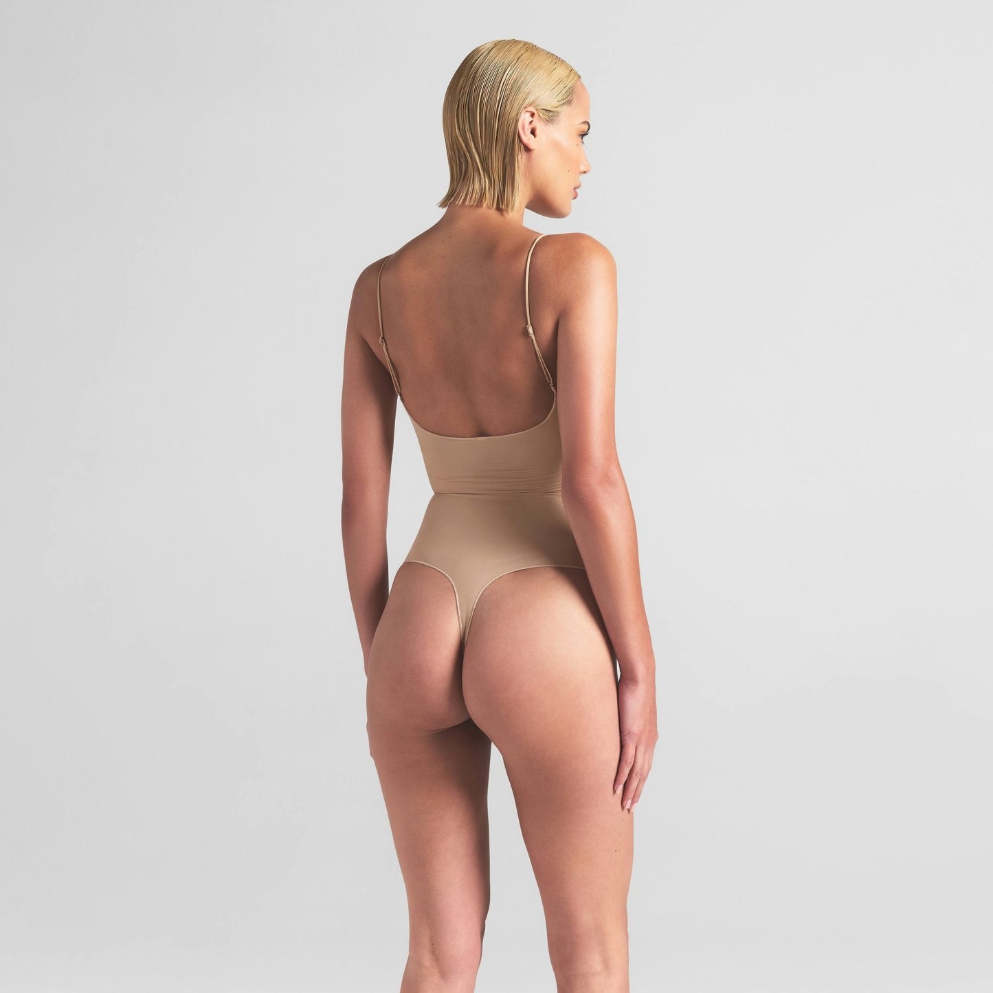 SHEER SEAMLESS THONG BODYSUIT - SAND