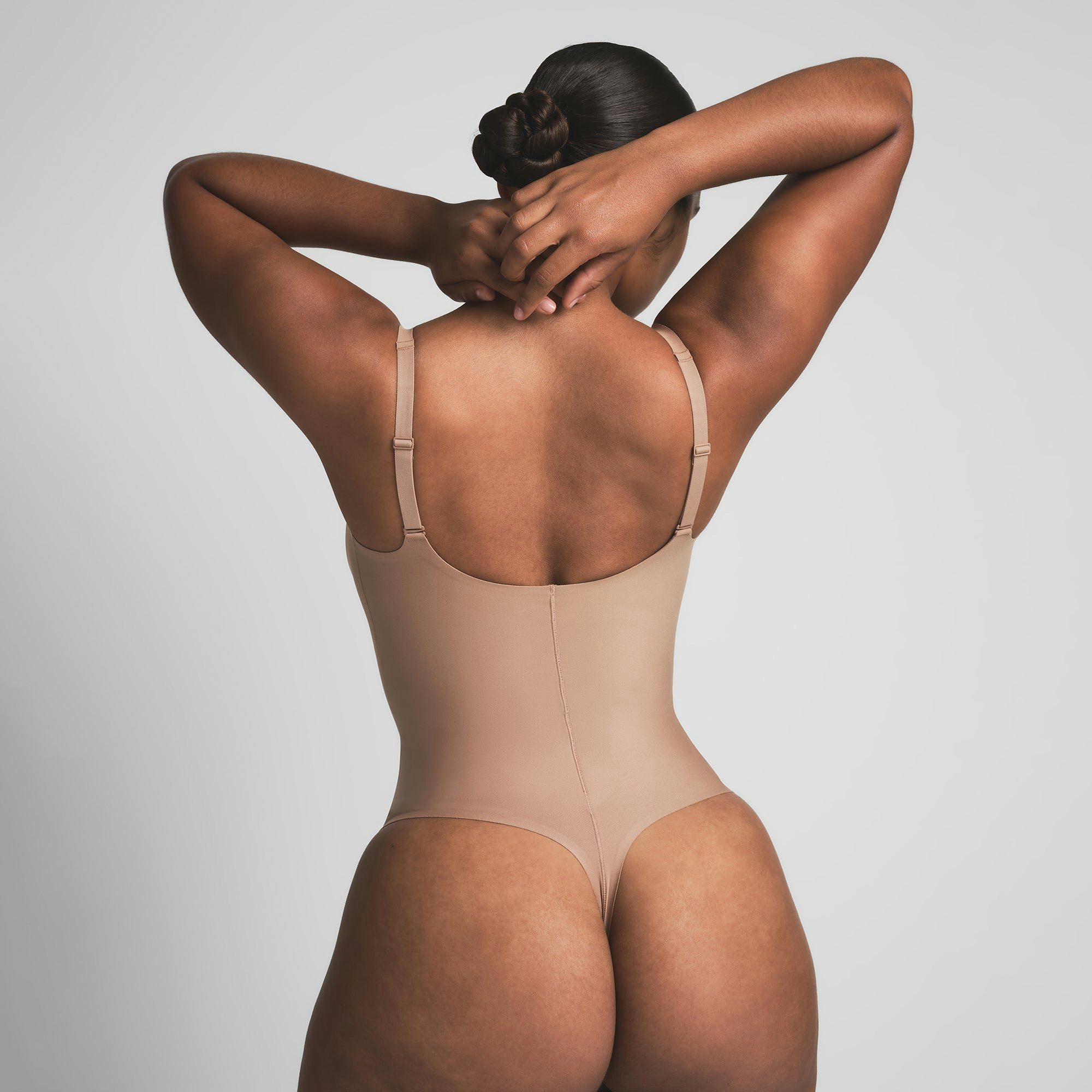 SKIMS BODY CORE SCULPT PLUNGE THONG BODYSUIT - SIENNA