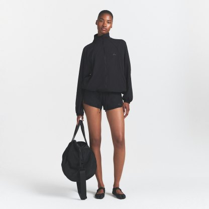 NikeSKIMS STRETCH NYLON OVERSIZED TRACK JACKET - OBSIDIAN - image 7