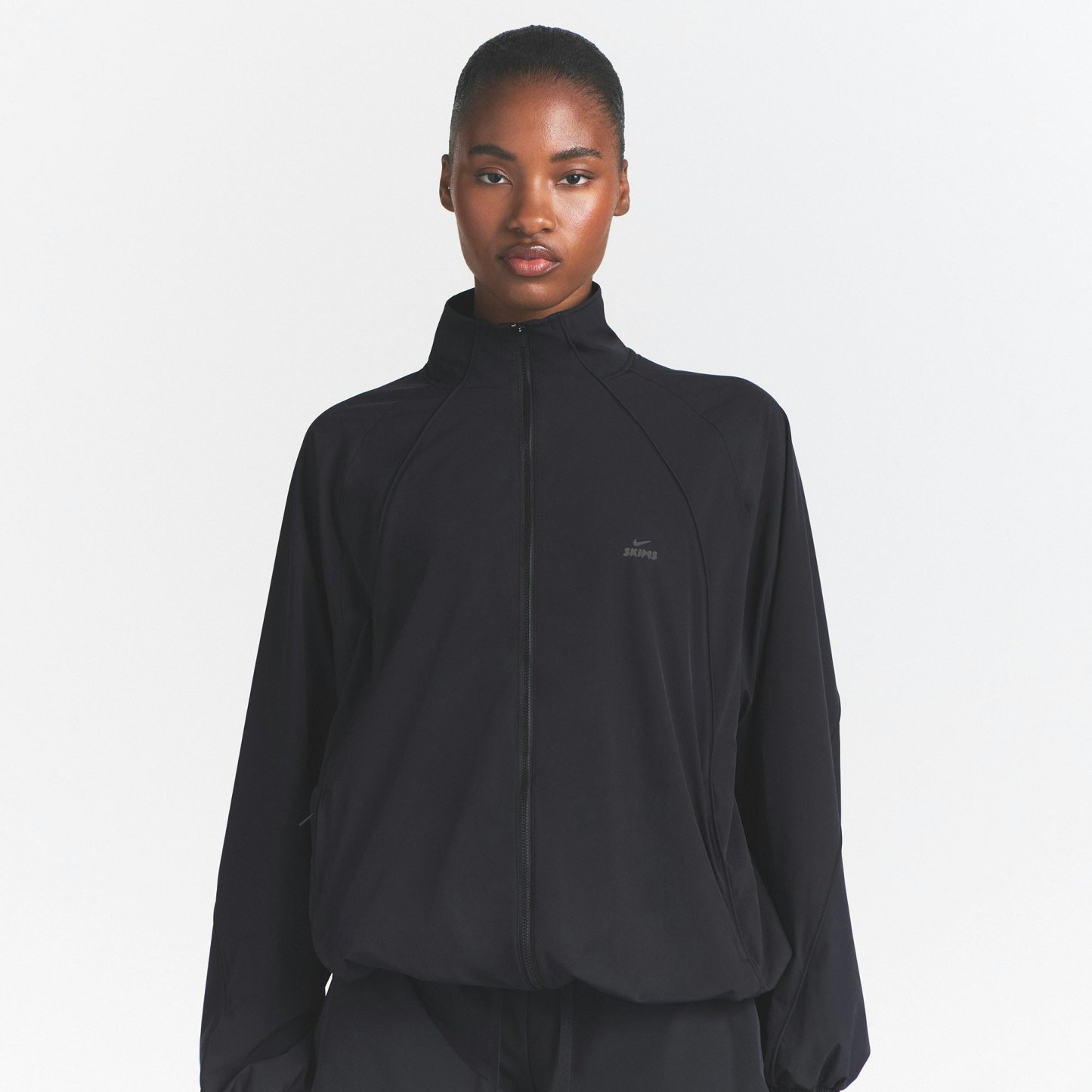 NikeSKIMS STRETCH NYLON OVERSIZED TRACK JACKET - OBSIDIAN - image 8