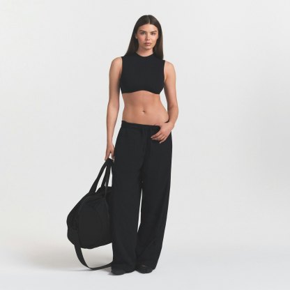 NikeSKIMS STRETCH NYLON OVERSIZED PANT - OBSIDIAN