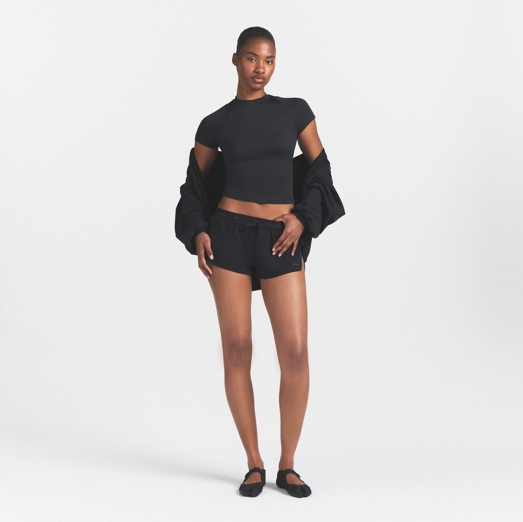 NikeSKIMS STRETCH NYLON RUNNER SHORT - OBSIDIAN - image 7