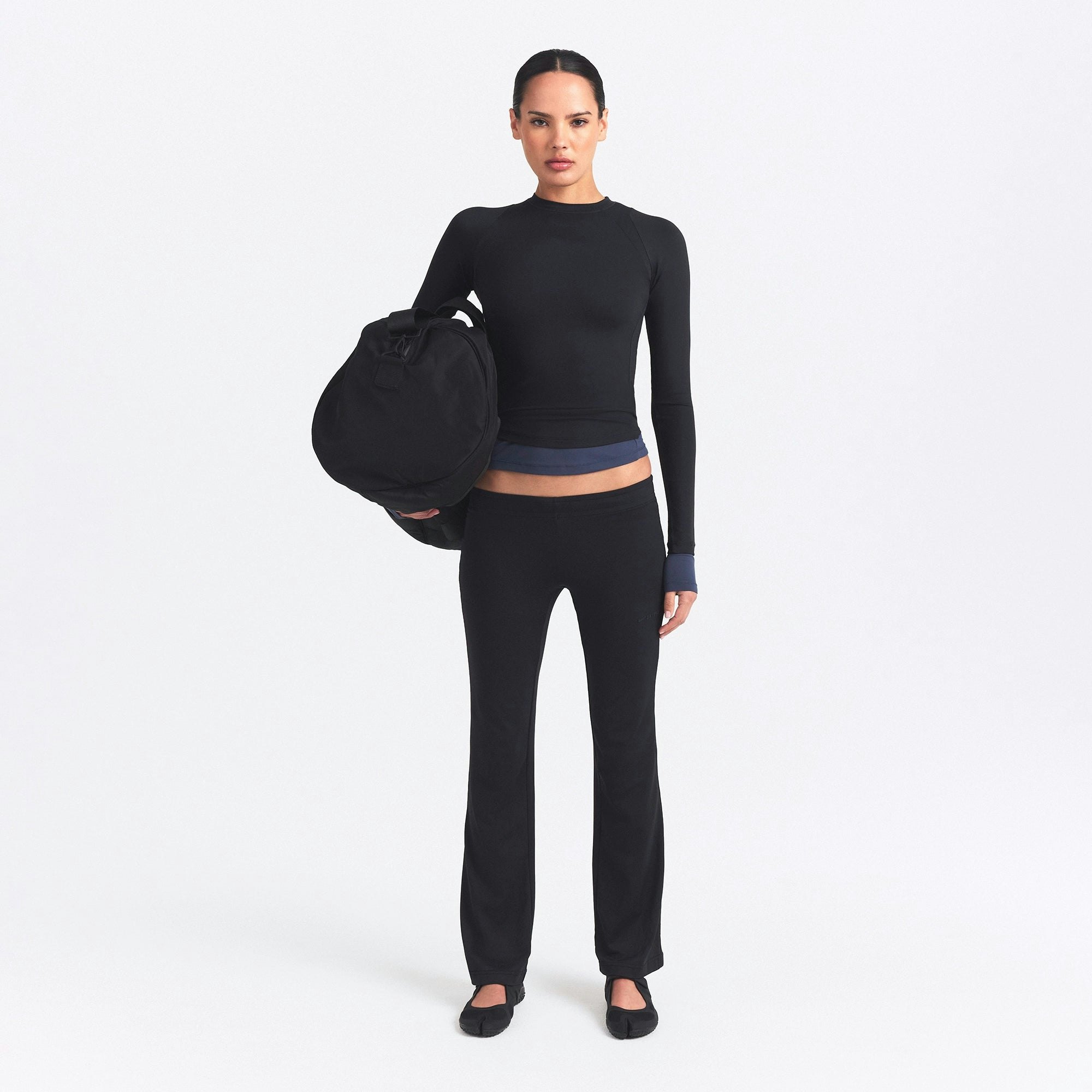 NikeSKIMS AIRY LOW RISE MINI FLARE PANT - OBSIDIAN