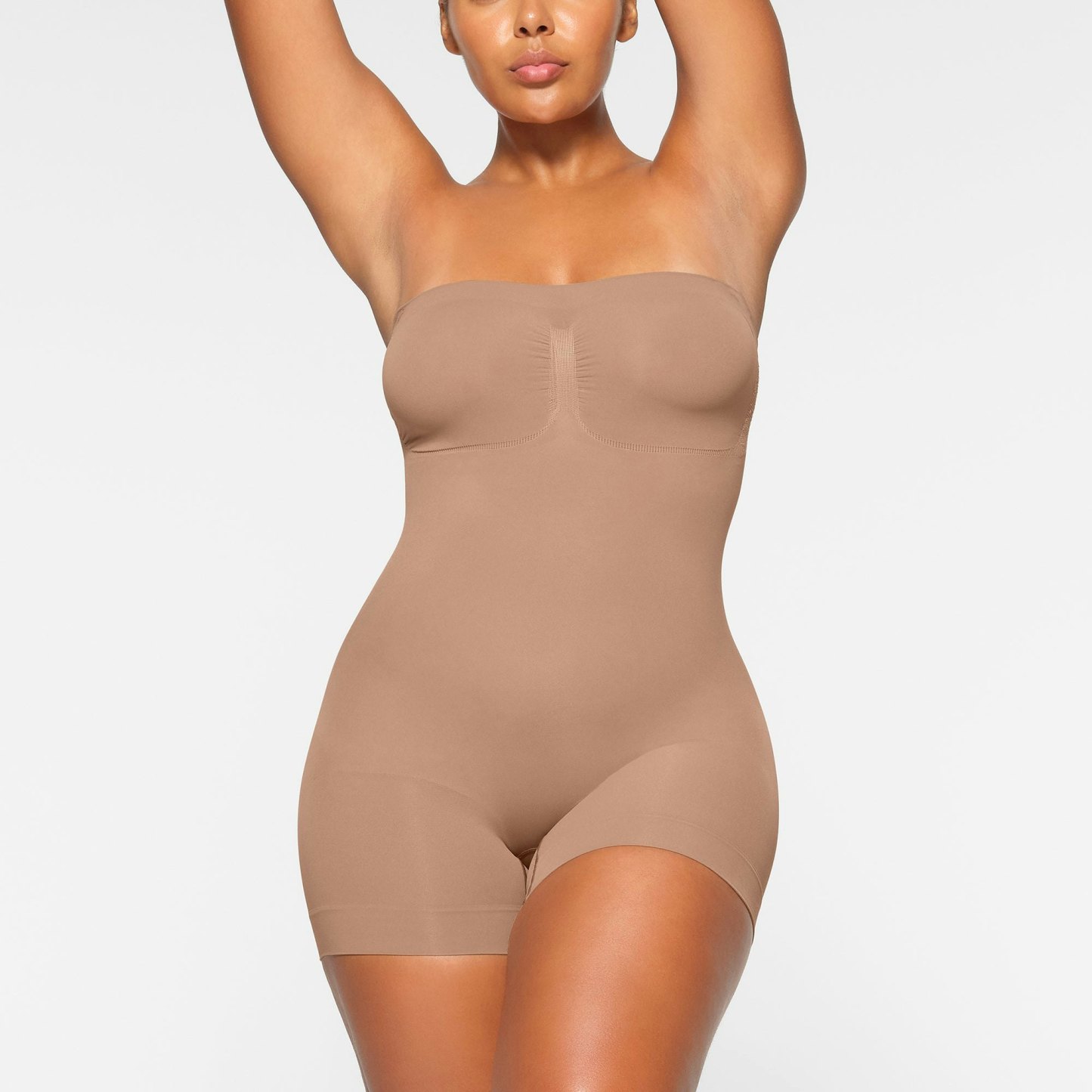 SEAMLESS SCULPT STRAPLESS SHORTIE BODYSUIT - SIENNA