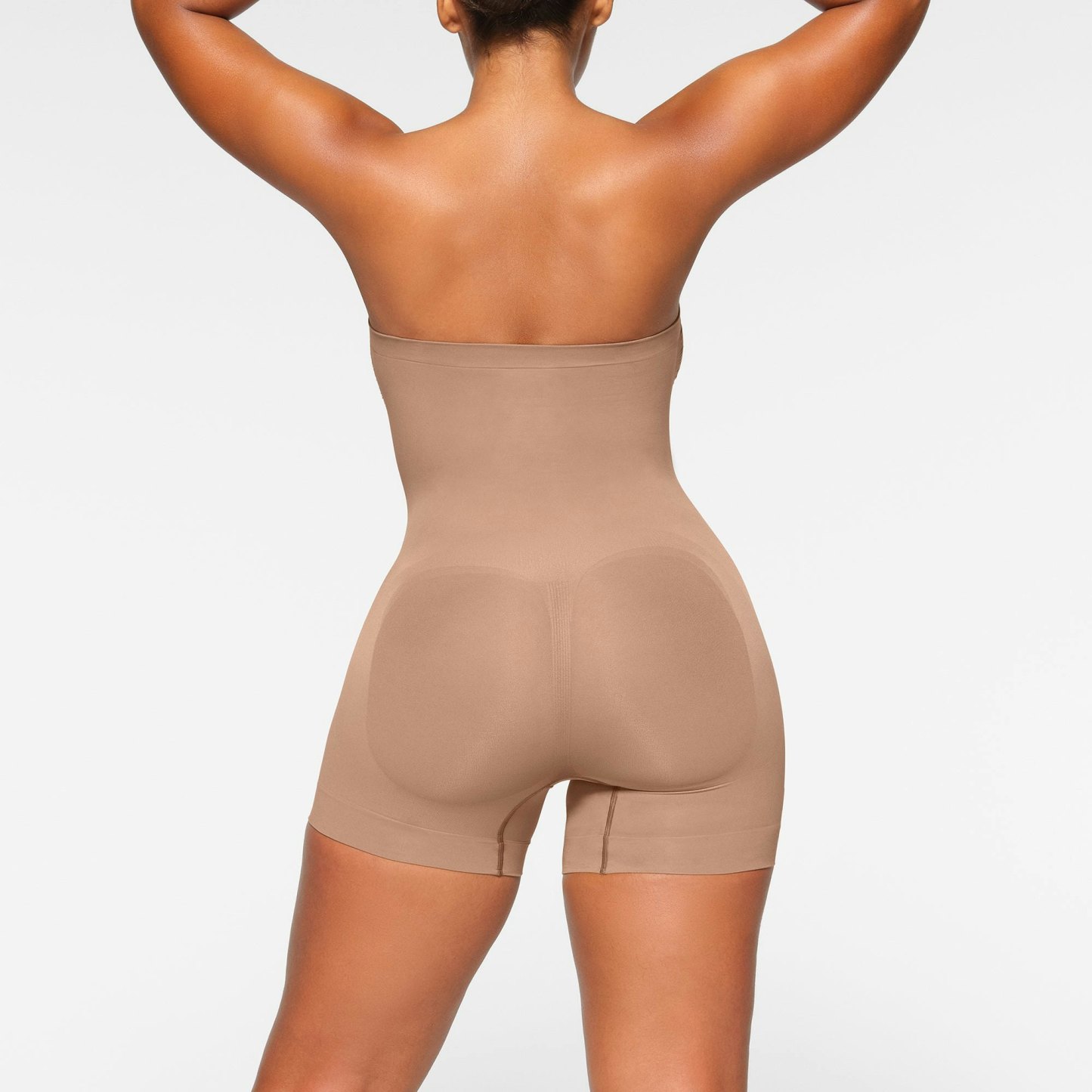 SEAMLESS SCULPT STRAPLESS SHORTIE BODYSUIT - SIENNA