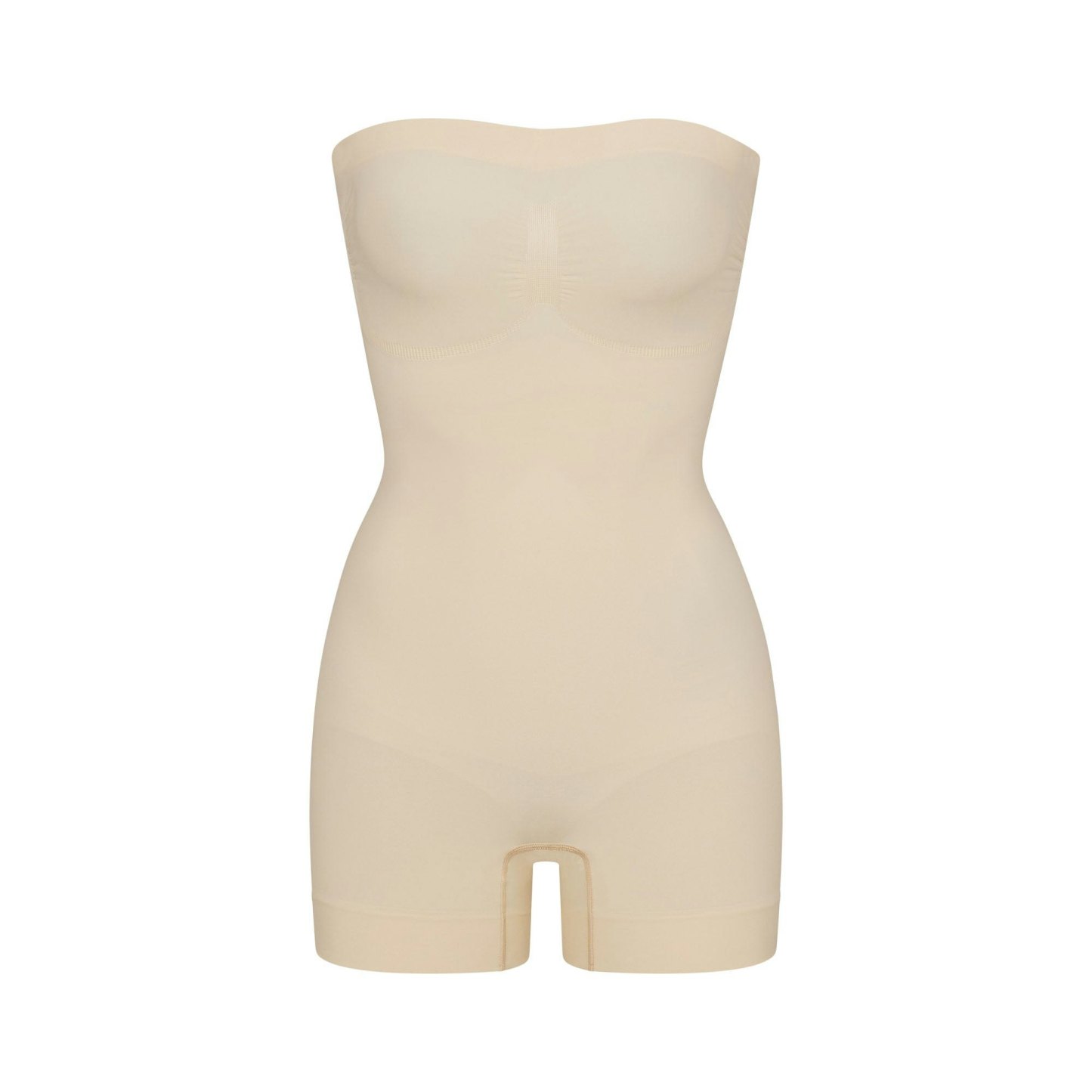 SEAMLESS SCULPT STRAPLESS SHORTIE BODYSUIT - SAND