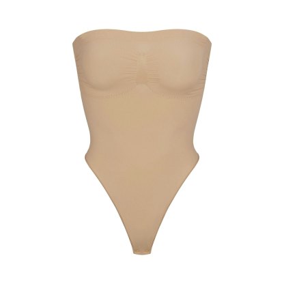 SEAMLESS SCULPT STRAPLESS THONG BODYSUIT - CLAY
