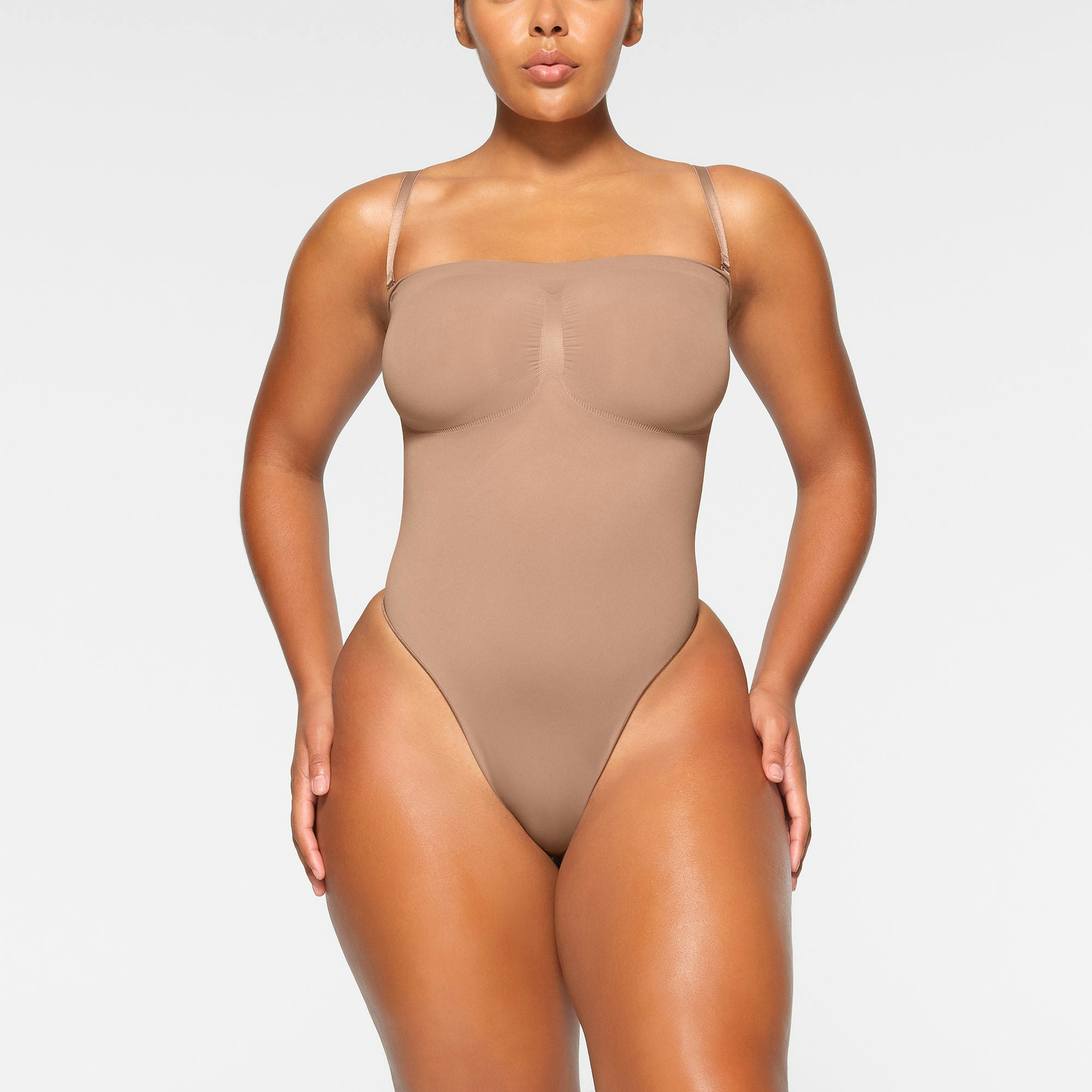 SEAMLESS SCULPT STRAPLESS THONG BODYSUIT - SIENNA