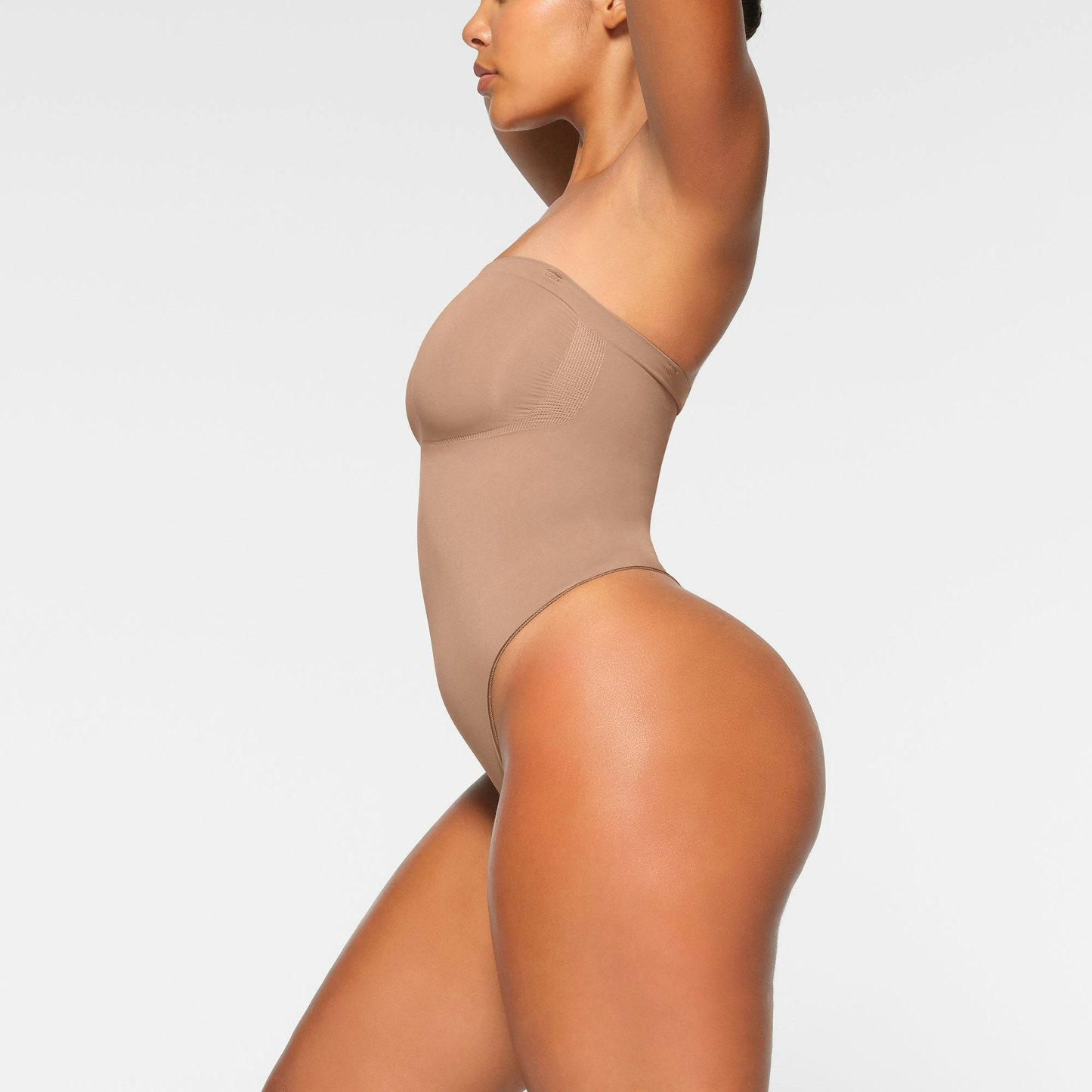 SEAMLESS SCULPT STRAPLESS THONG BODYSUIT - SIENNA