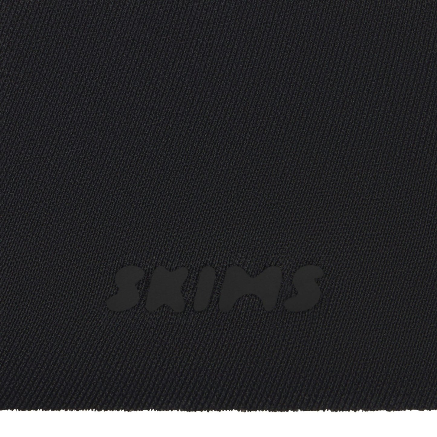 SKIMS ULTIMATE BODY PUSH-UP THONG BODYSUIT - ONYX