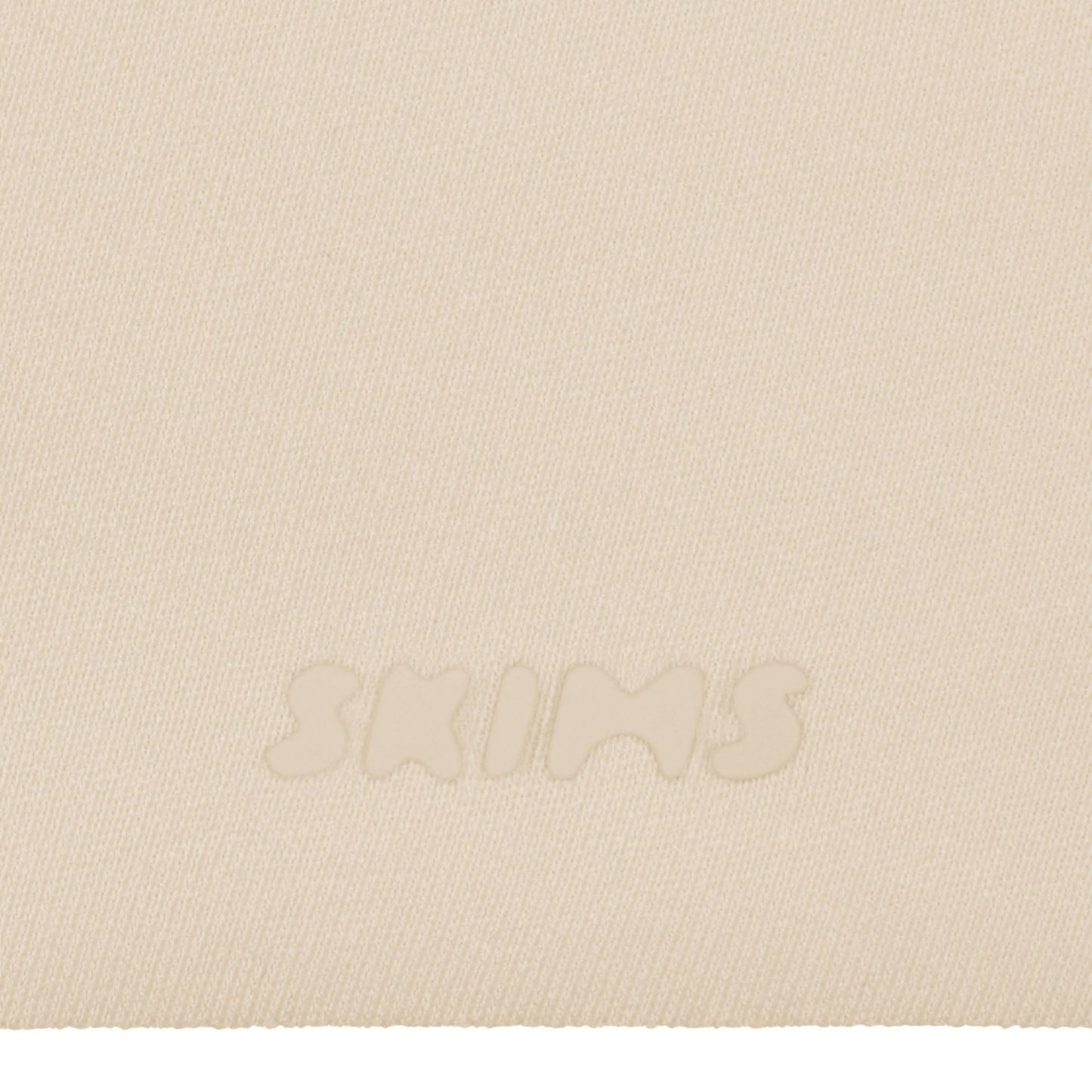 SKIMS ULTIMATE BODY PUSH-UP THONG BODYSUIT - SAND