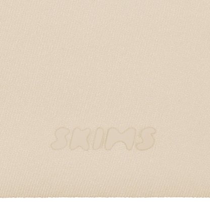 SKIMS ULTIMATE BODY PUSH-UP THONG BODYSUIT - SAND