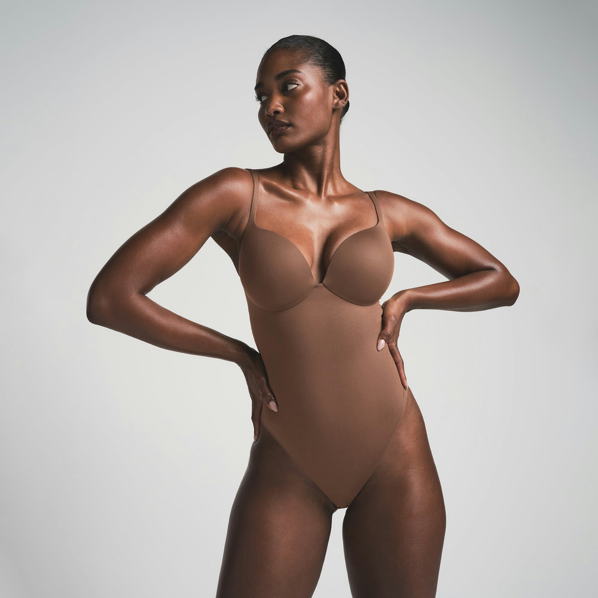 SKIMS ULTIMATE BODY PUSH-UP THONG BODYSUIT - JASPER