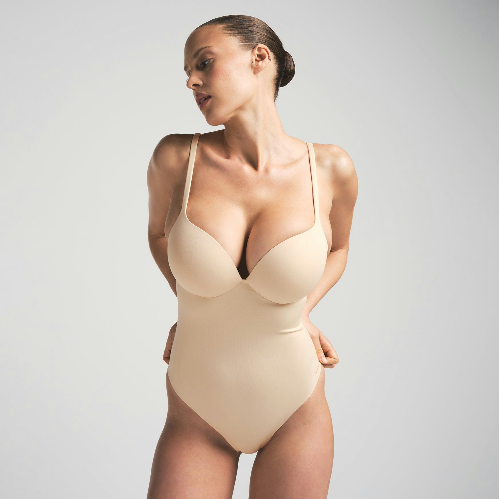 SKIMS ULTIMATE BODY PUSH-UP THONG BODYSUIT - SAND