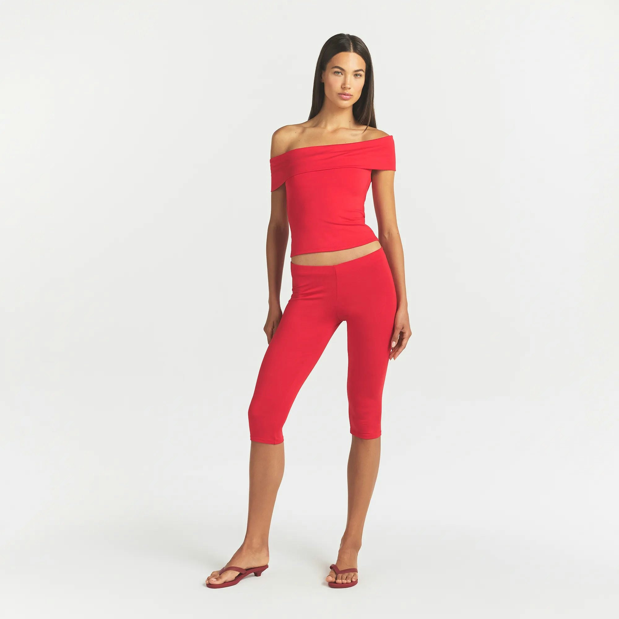 SMOOTH LAYERS ASYMMETRICAL OFF THE SHOULDER TOP - CARMINE