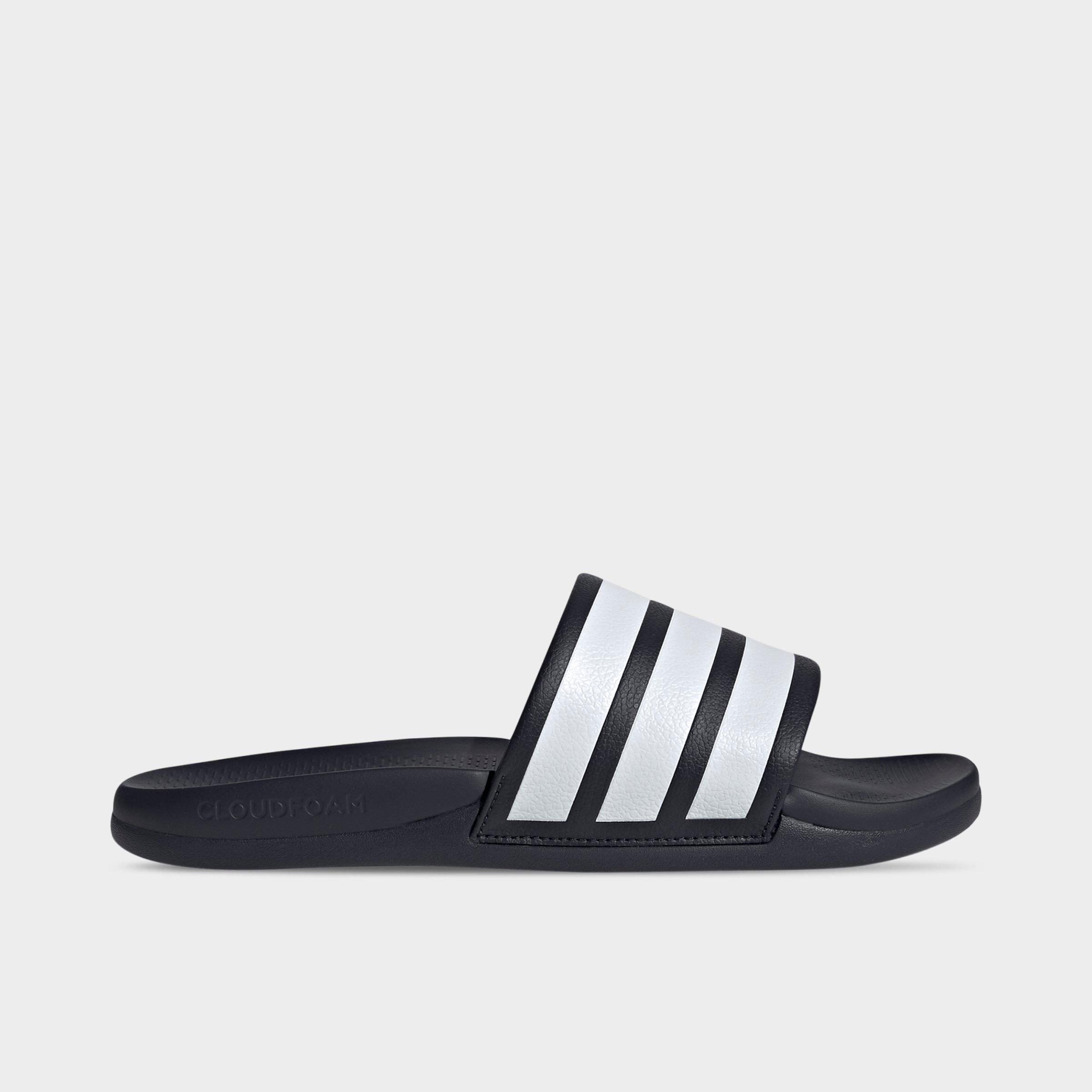 Women's adidas Adilette Comfort 2.0 Slide Sandals - Legend Ink/Cloud White/Legend Ink - Left shoe facing left. Outside of the shoe.