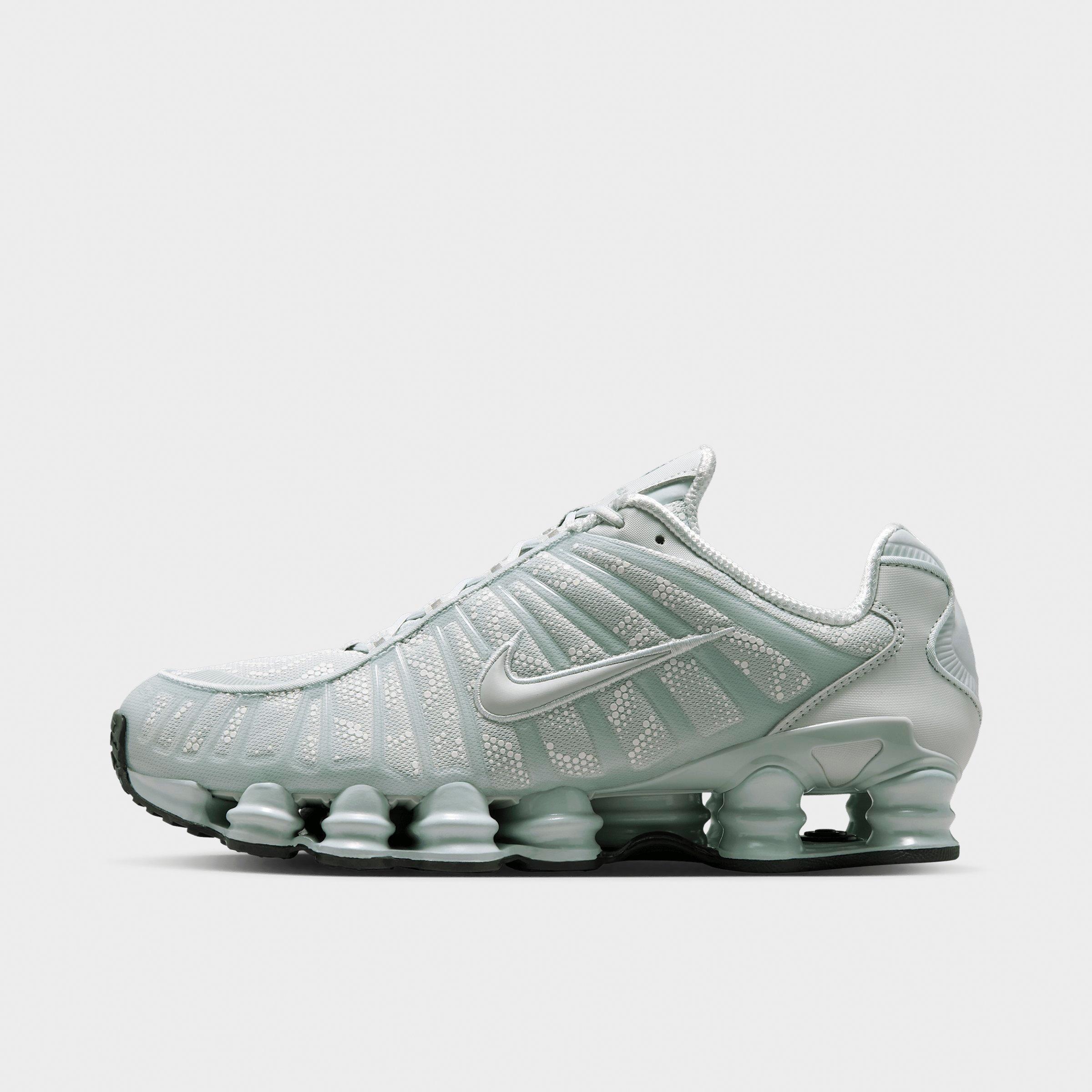 Men's Nithtke Shox TL Casual Shoes - Part 1 - Light Silver/Newsprint/Light Silver - Left shoe facing left. Outside of the shoe.