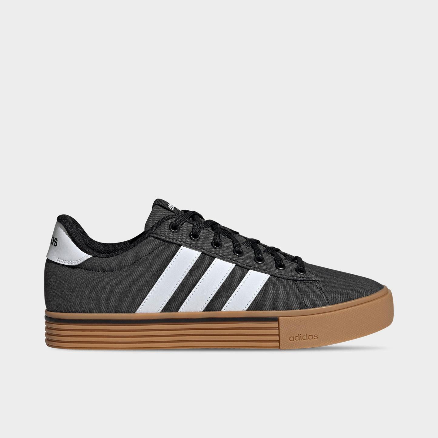 Men's adidas Daily 4.0 Casual Shoes (Big Kids' Sizes Available) - Part 1 - Black/White/Gum - Left shoe facing left. Outside of the shoe.