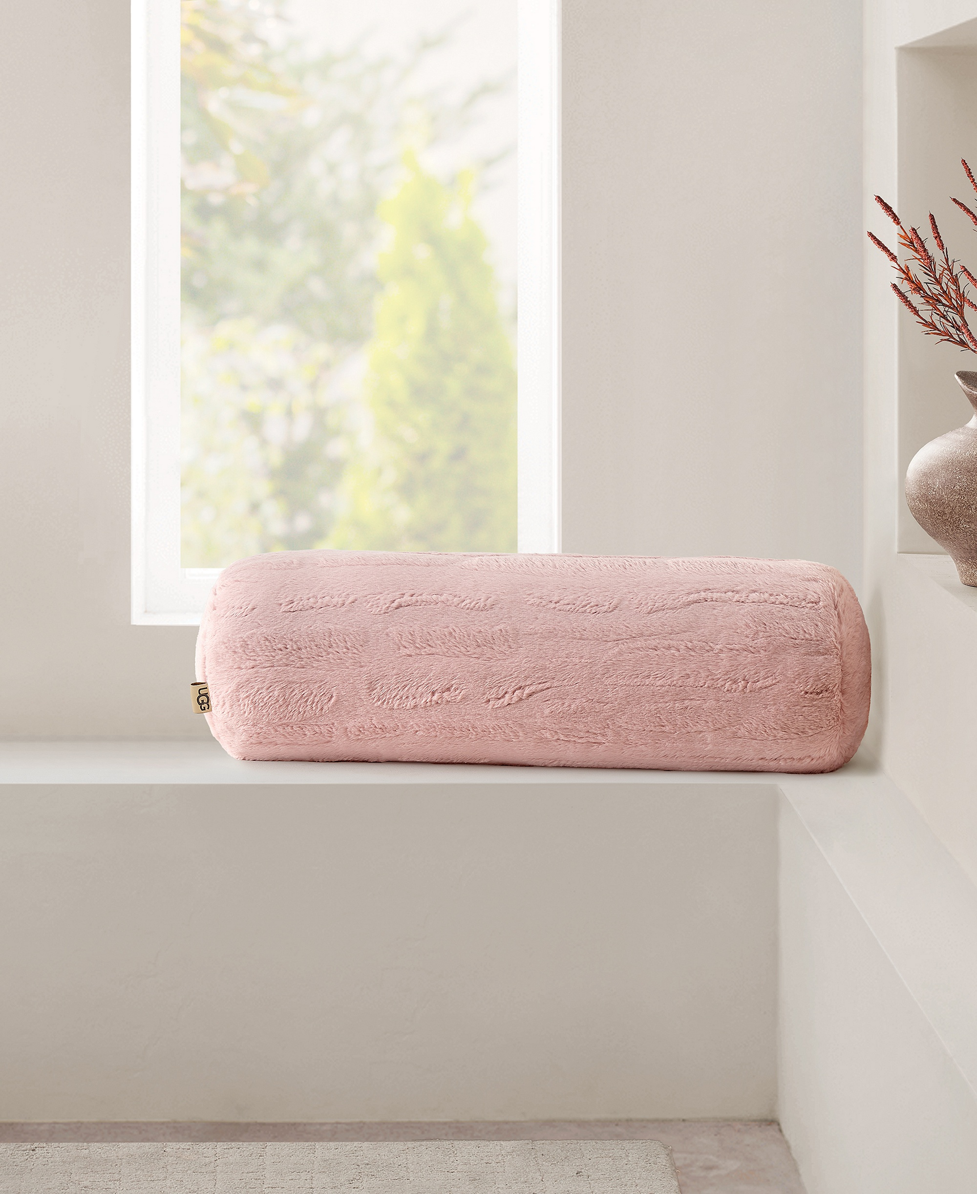 UGG® Valor Carved Faux-Fur Bolster Decorative Pillow, 8" x 26" - Lotus Blossom