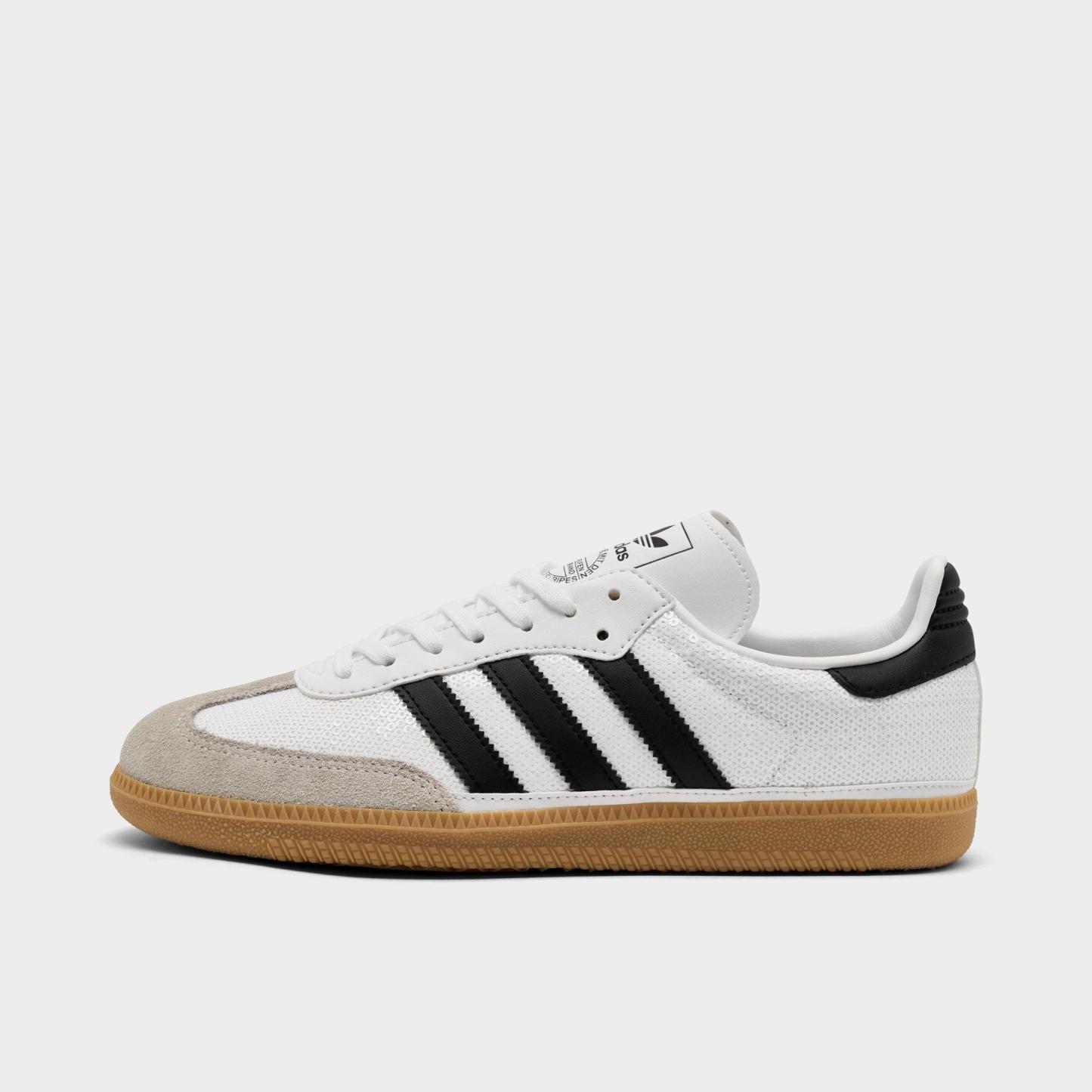 Big Kids' adidas Originals Samba OG Casual Shoes - Part 1 - Footwear White/Core Black/Grey One - Left shoe facing left. Outside of the shoe.