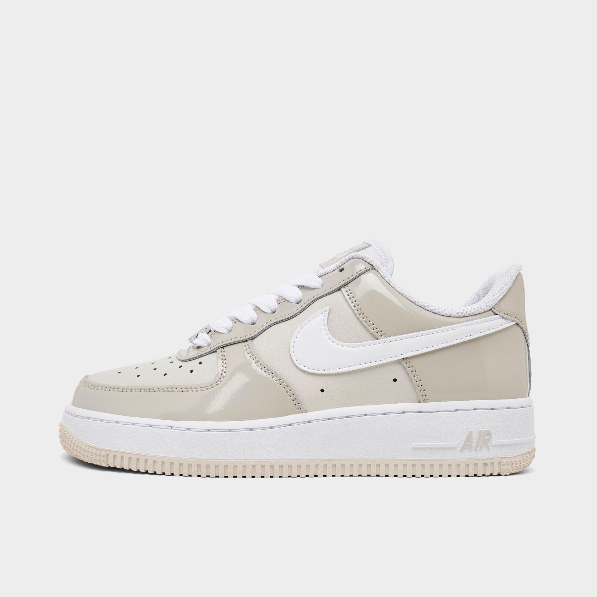 Women's Nithtke Air Force 1 '07 Casual Shoes - Cream II/White/Light Orewood Brown - Left shoe facing left. Outside of the shoe.