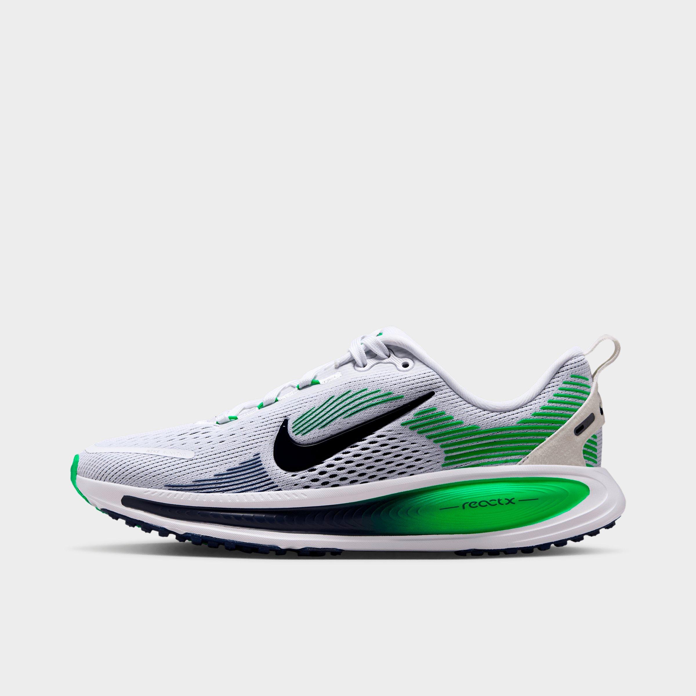 Big Kids' Nithtke Vomero 18 Running Shoes - Part 1 - White/Midnight Navy/Green Spark - Left shoe facing left. Outside of the shoe.