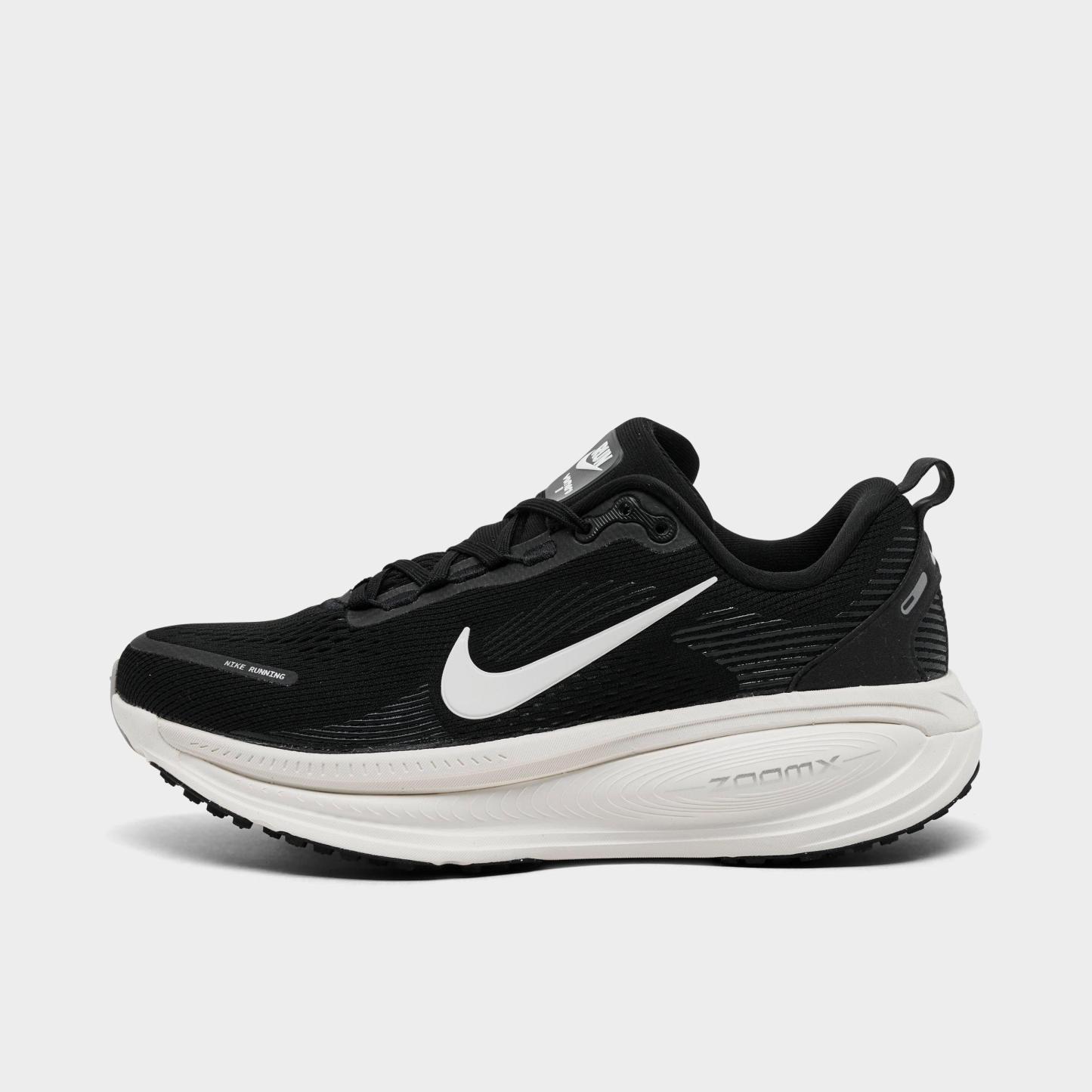 Women's Nithtke Vomero 18 Running Shoes - Part 1 - Black/Coconut Milk/Light Iron Ore/Summit White - Left shoe facing left. Outside of the shoe.