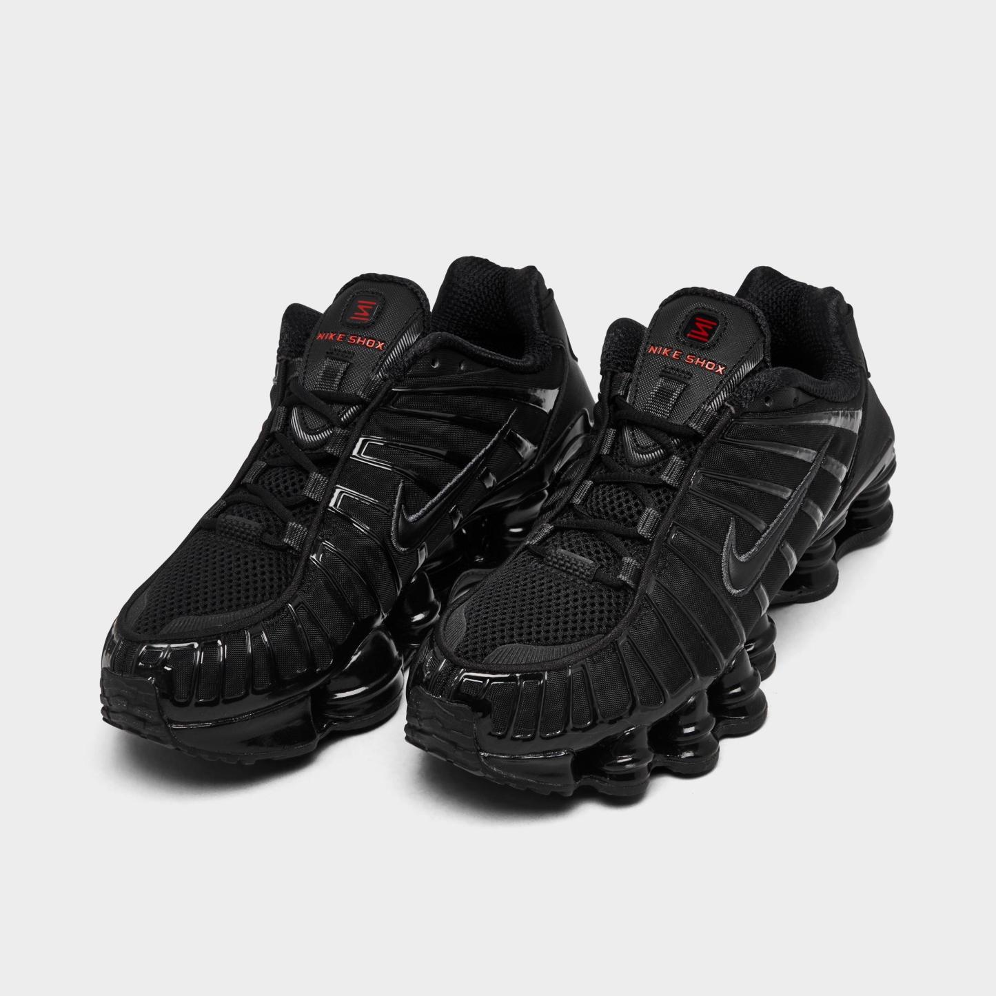 Women's Nithtke Shox TL Casual Shoes - Black/Black/Metallic Hematite/Max Orange - Both shoes facing left
