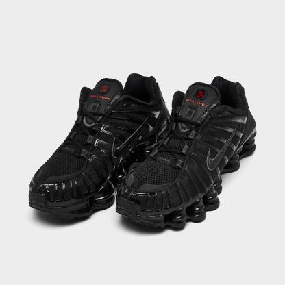 Women's Nithtke Shox TL Casual Shoes - Black/Black/Metallic Hematite/Max Orange - Both shoes facing left