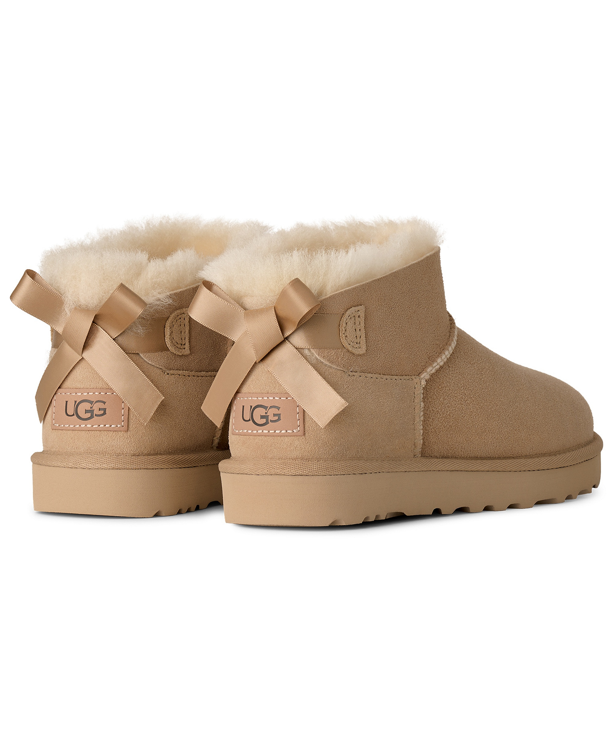 UGG® Women's Ultra Mini Bailey Bow Round Toe Booties - Sand