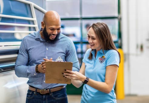 Man and Woman with clipboard