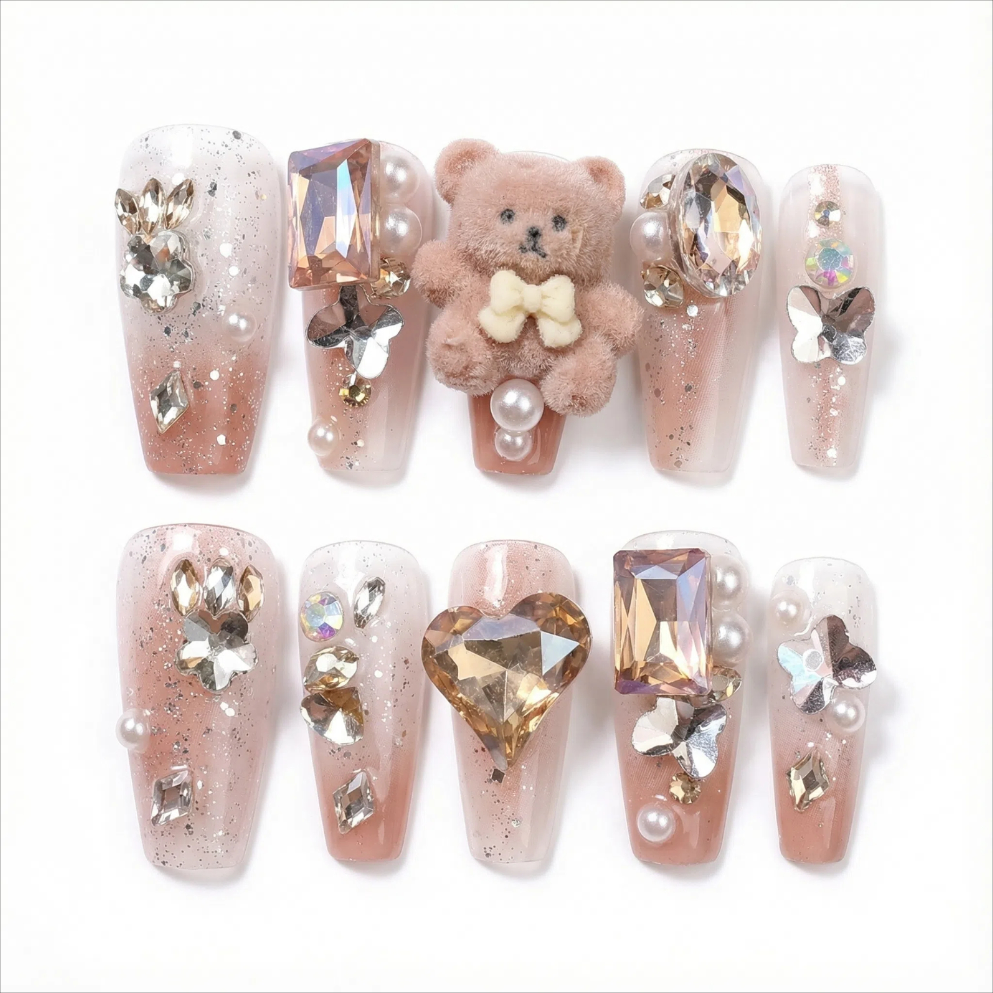 Press on nail set preview with teddy bear charm and rhinestone details (size guide image)