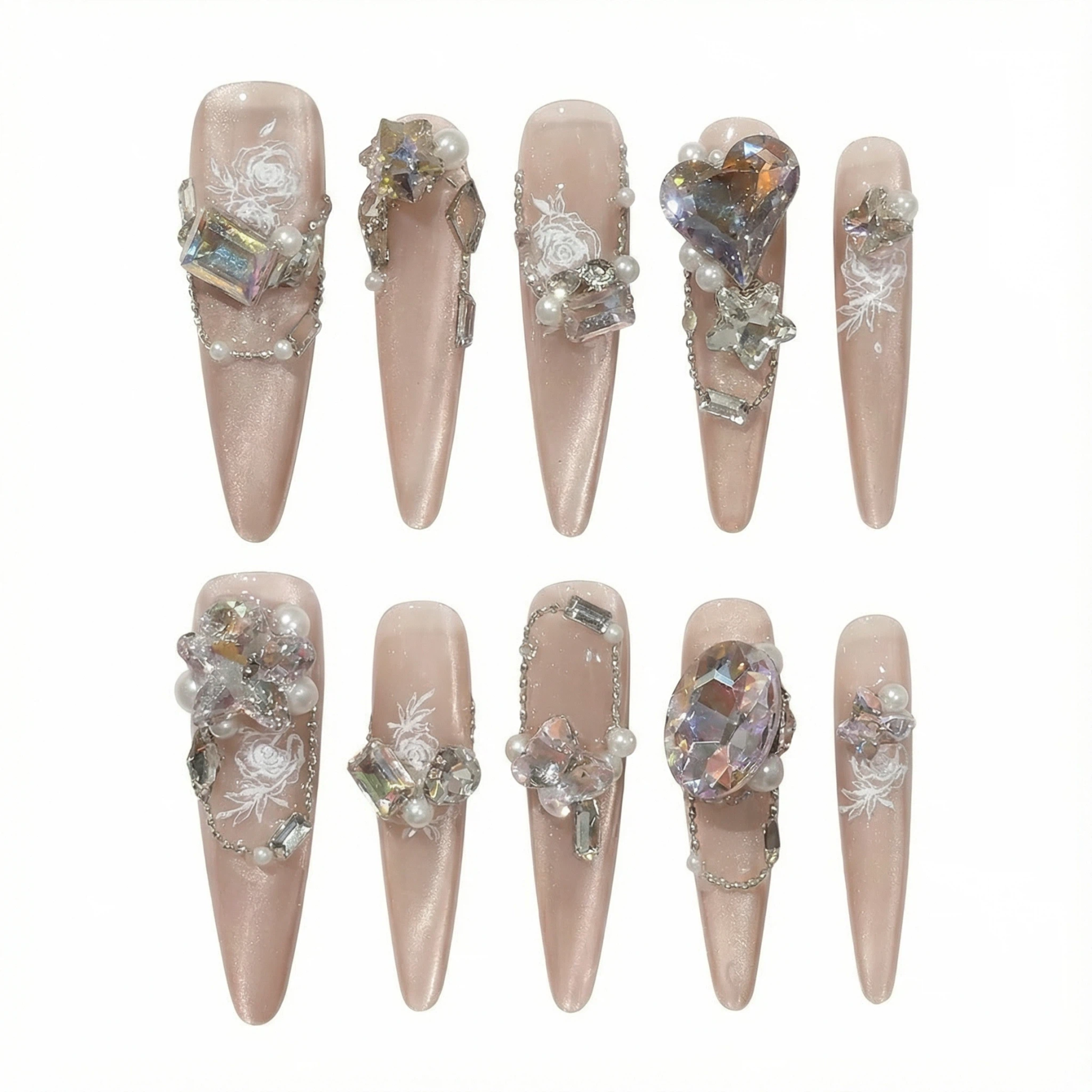 alt="Nude shimmer long almond press on nails with iridescent gems, pearls and white rose details"