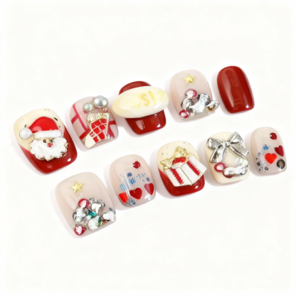 alt="Christmas Santa press on nails set in red and nude with gifts, hearts and bow designs on short square tips"